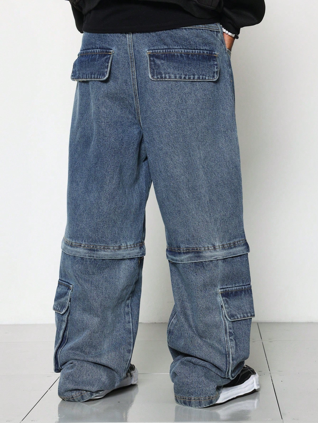 Loose Fit Washed Multi Pocket Cargo Jean With Hidden Zipper Convertible To Short