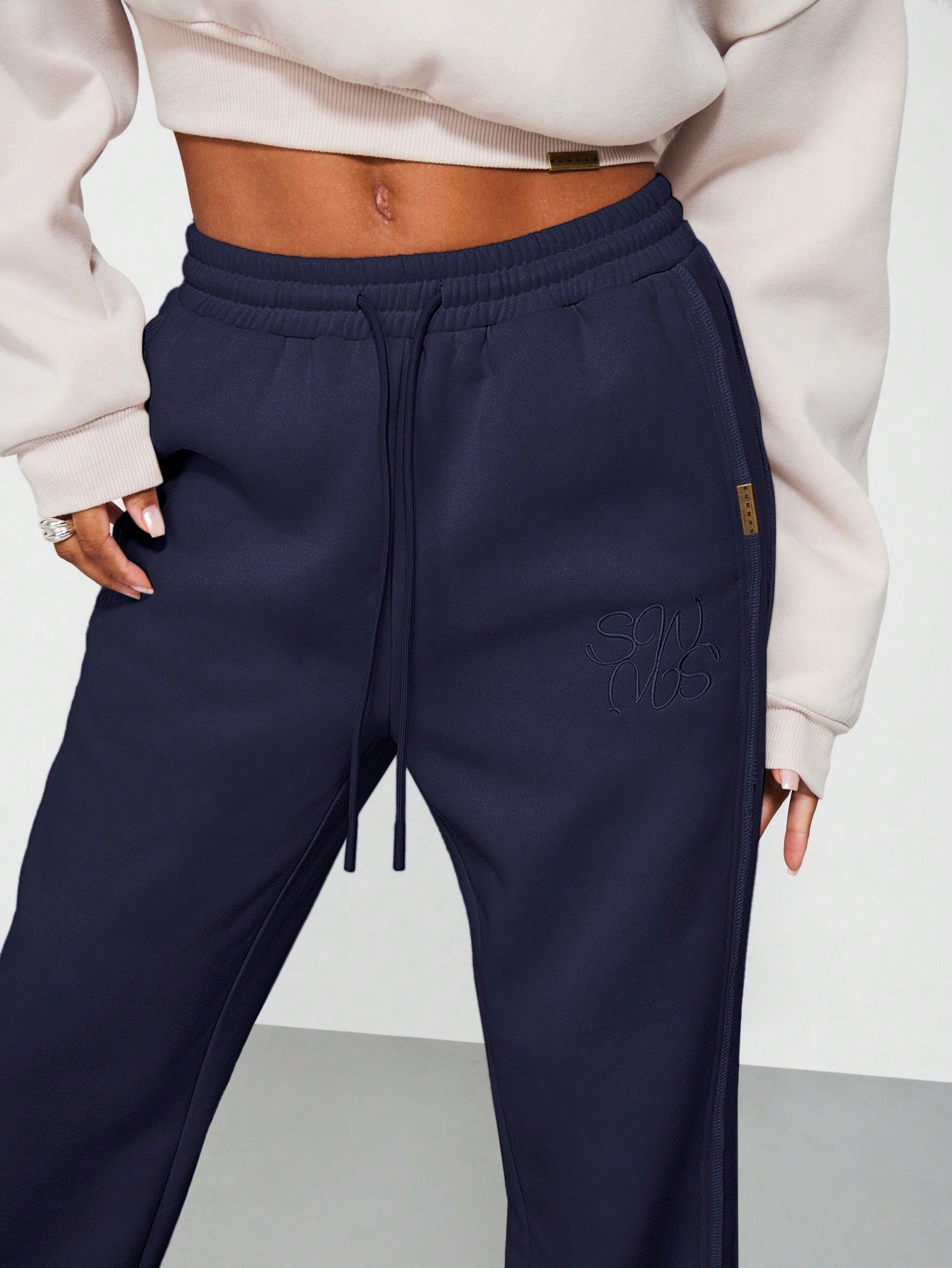 SUMWON WOMEN Flare Fit Side Split Sweatpants