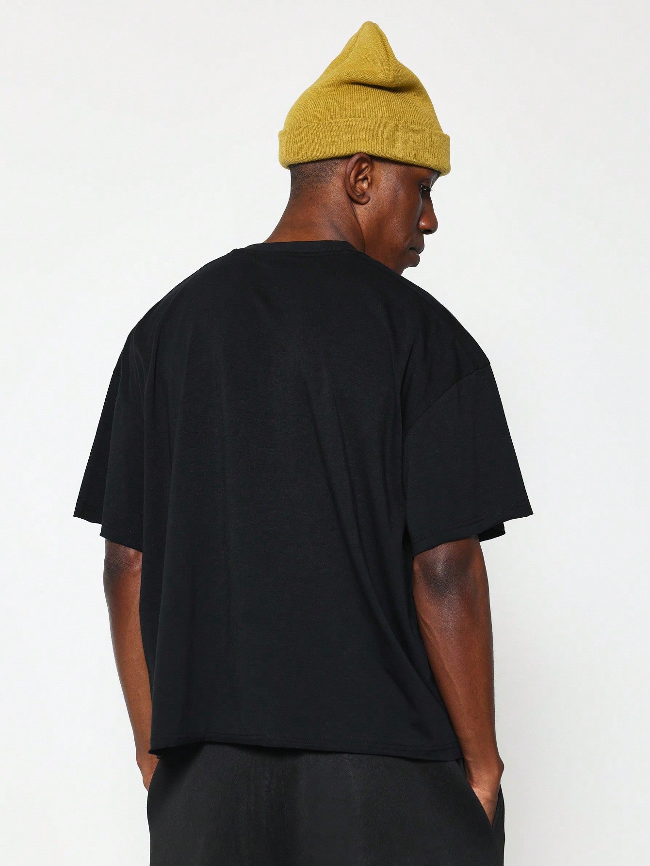 Boxy Raw Edge Cap Sleeve Tee With Small Graphic Print