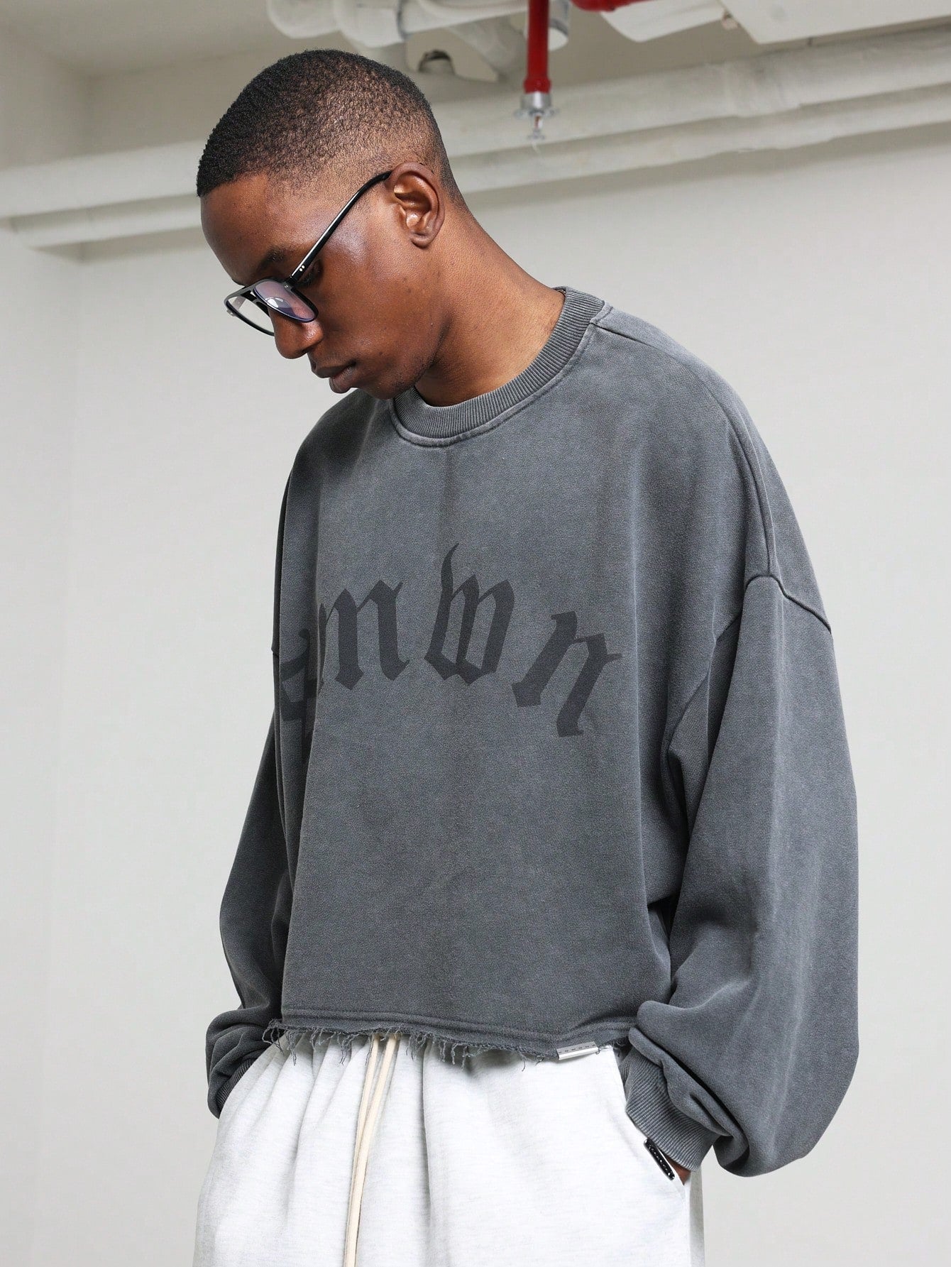 Crop Fit Washed Raw Edge Sweatshirt With Graphic Print