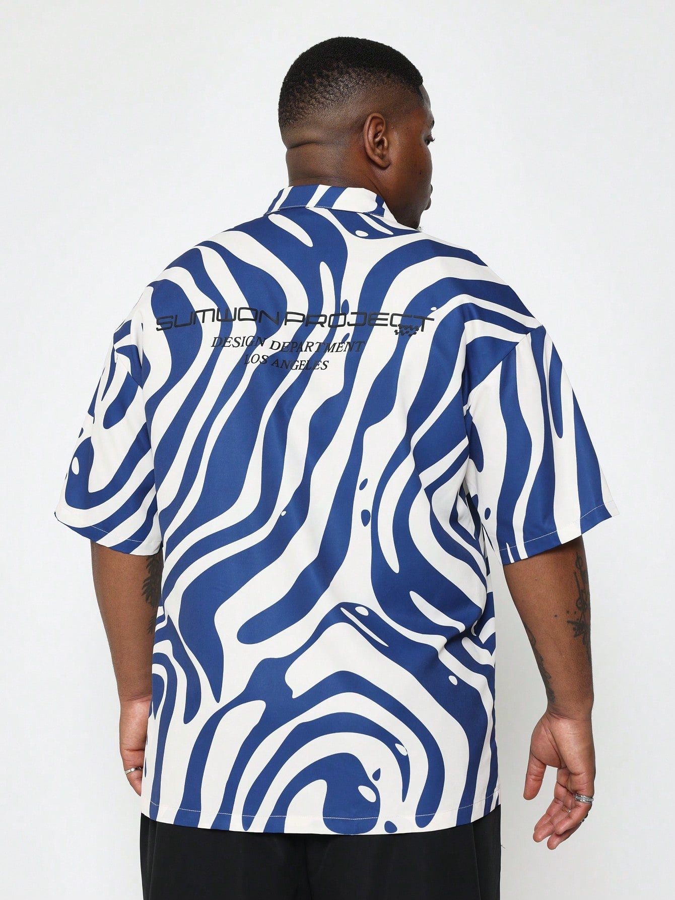 Plus Size Short Sleeve All Over Swirl Print Shirt With Back Graphic Print