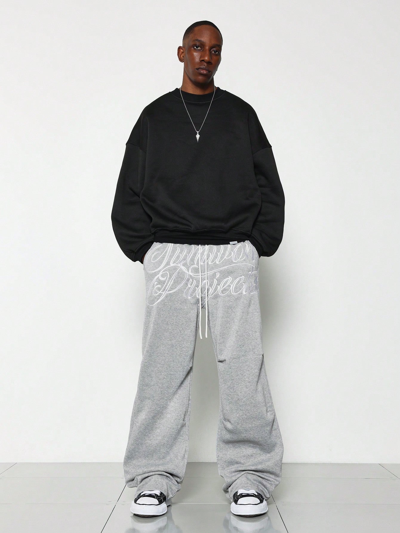 Straight Fit Sweatpants With Large Front Embroidery