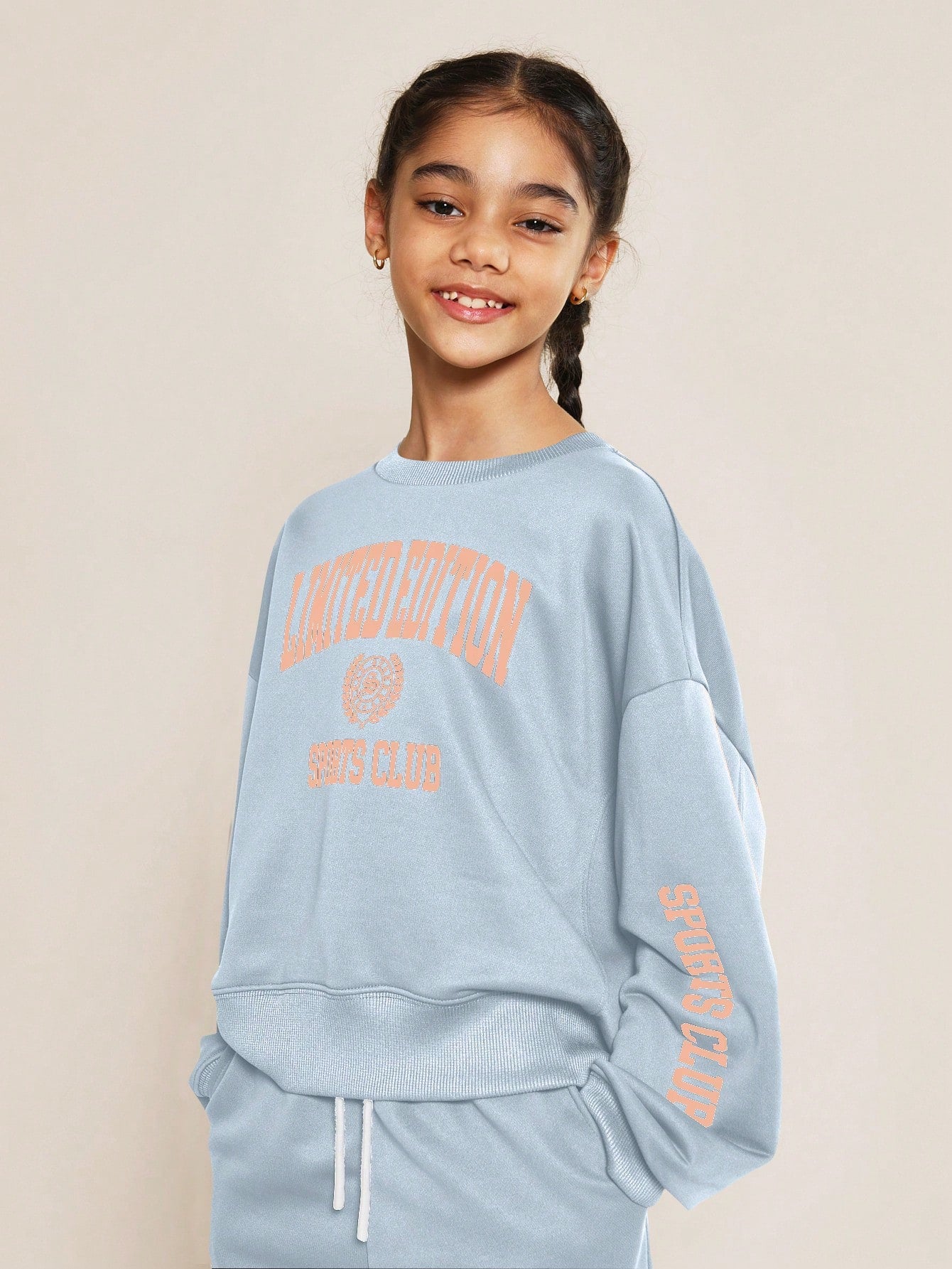 Tween Girls Crew Neck Drop Shoulder Sweatshirt With Limited Edition Graphic Print And Straight Fit Cargo Pant 2 Piece Set