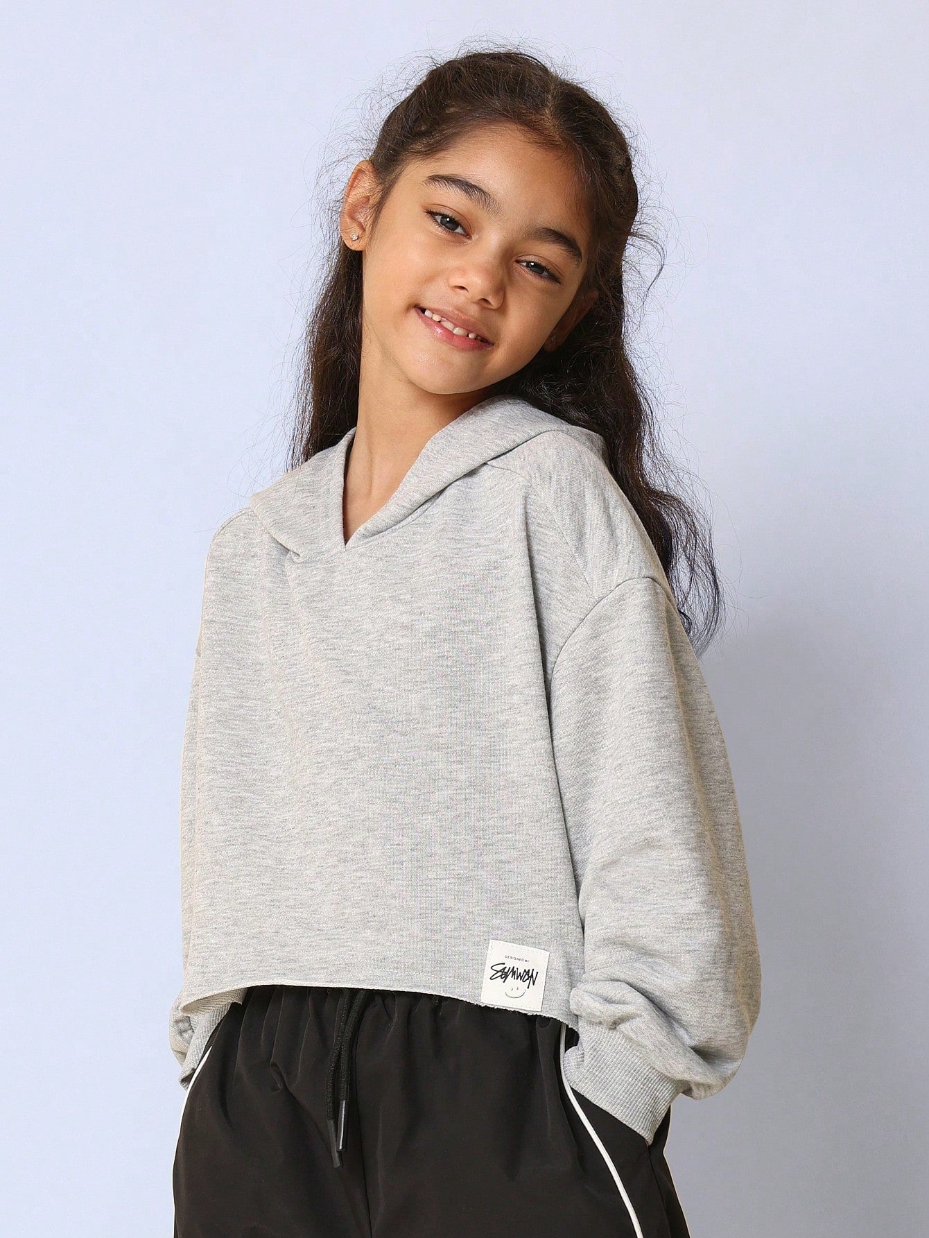 Tween Girls Crop Overhead Raw Hem Hoodie And Loose Fit Pant With Graphic Print 2 Piece Set