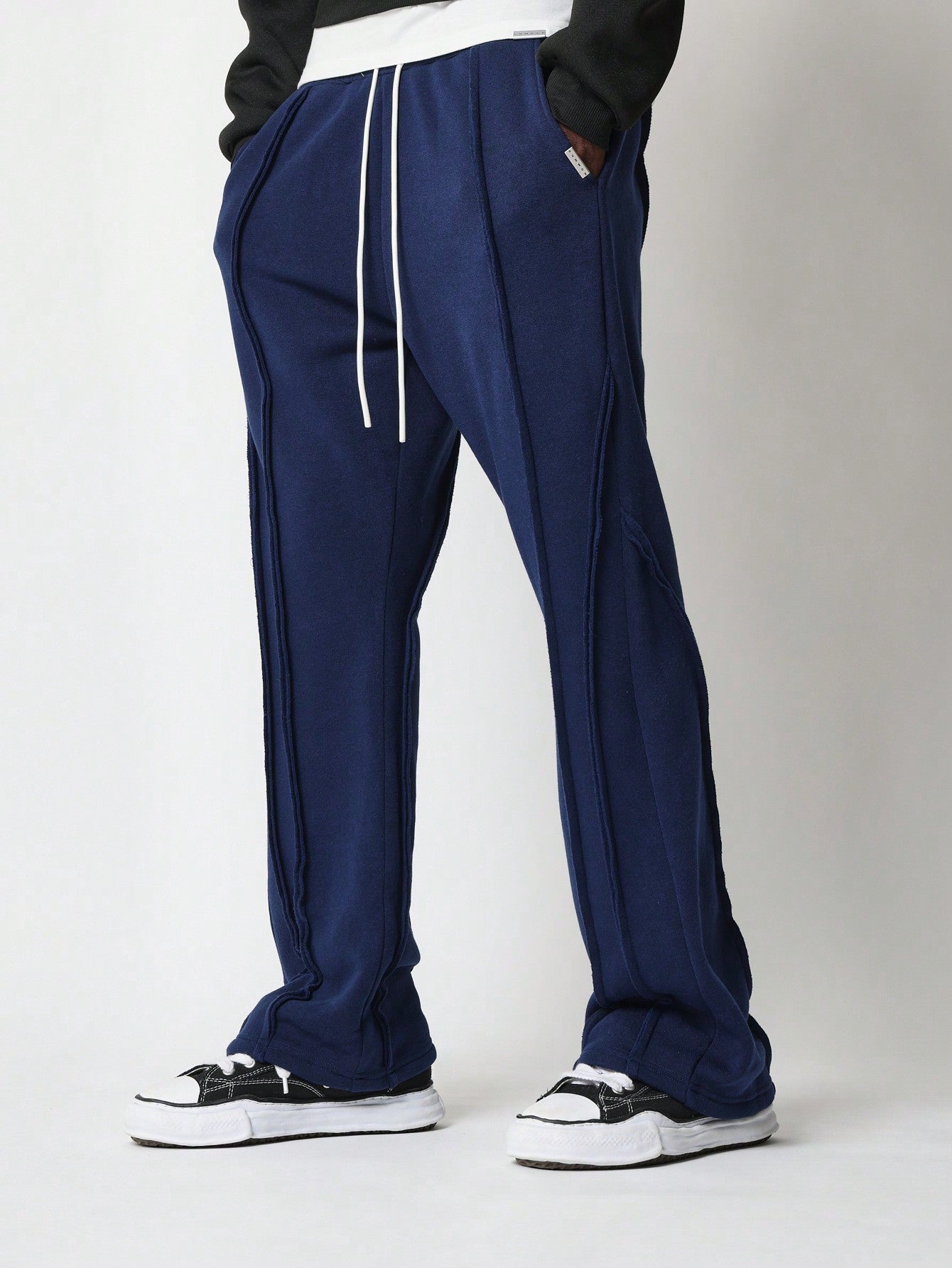 Flare Fit Multi Raw Edge Exposed Seam Sweatpants With Drawcord