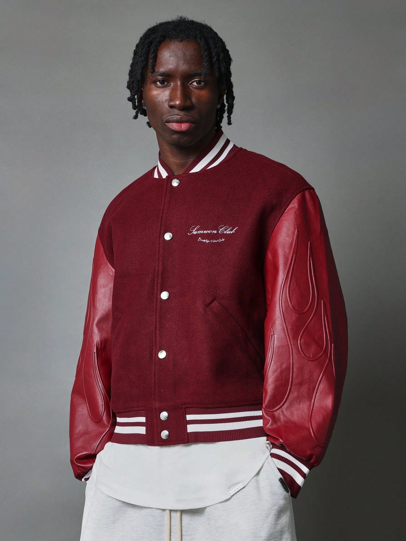 Varsity Jacket With Embossed PU Sleeve And From Embroidery