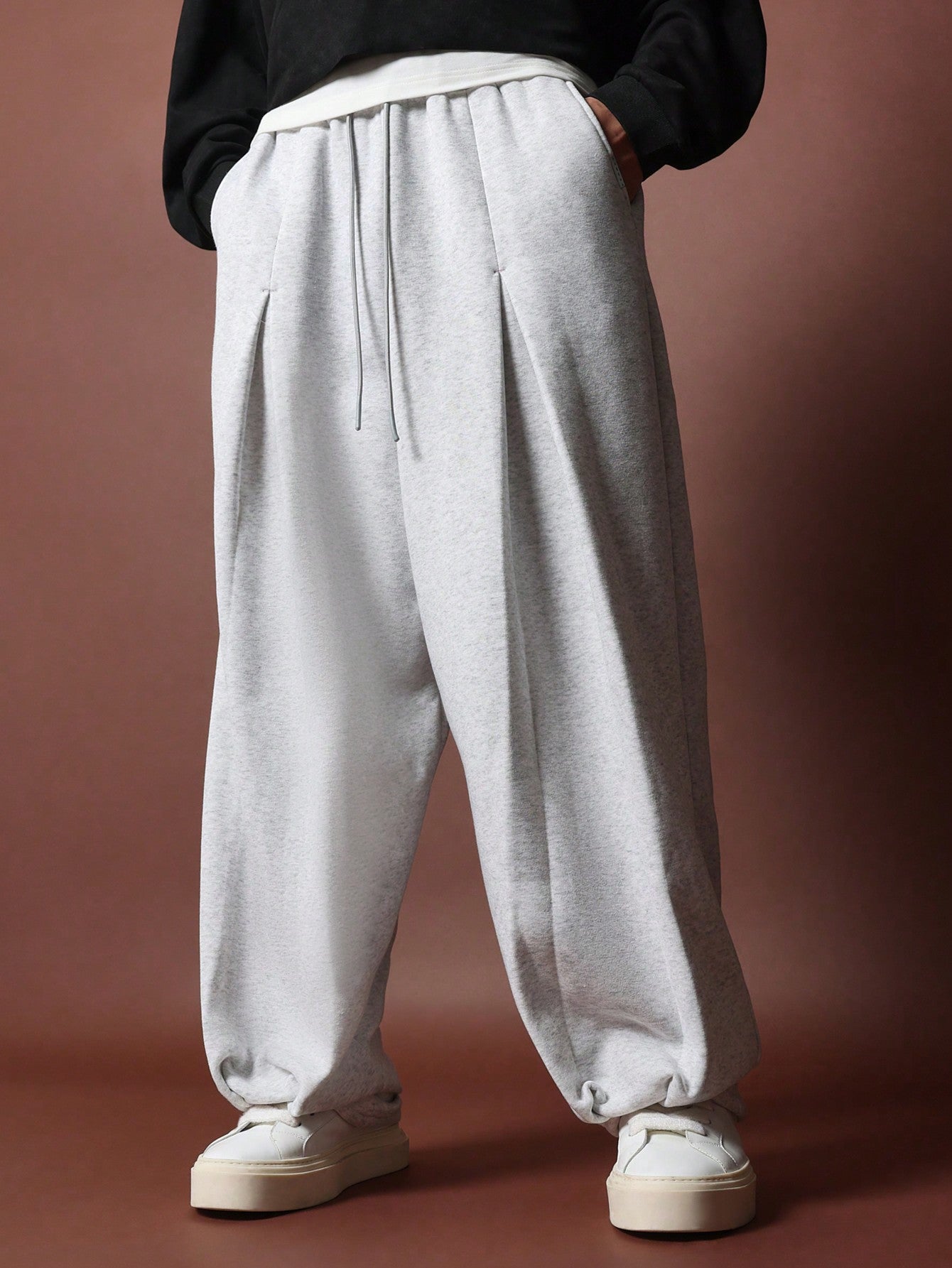 Loose Fit Sweatpants With Pleat Detail