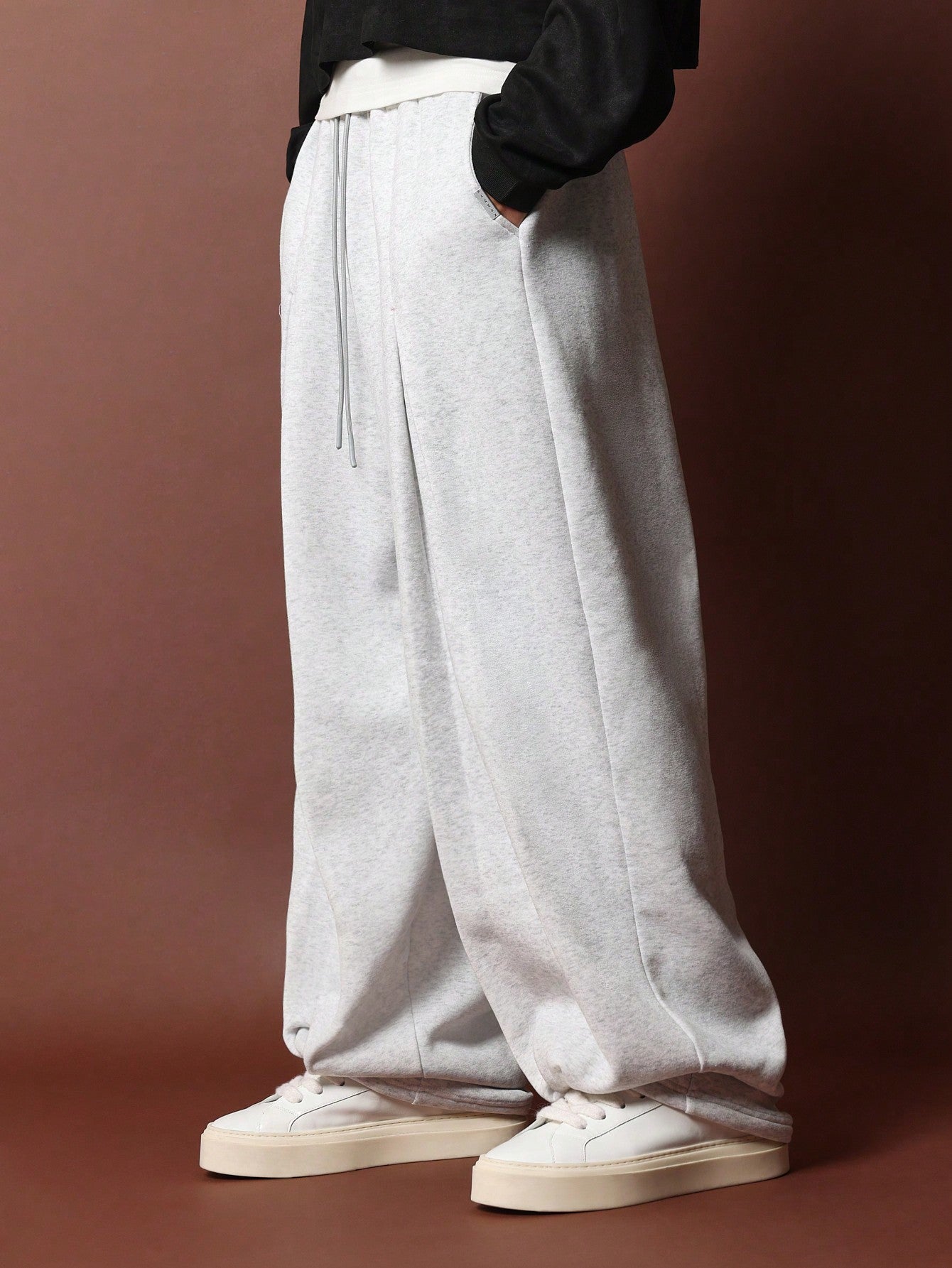 Loose Fit Sweatpants With Pleat Detail