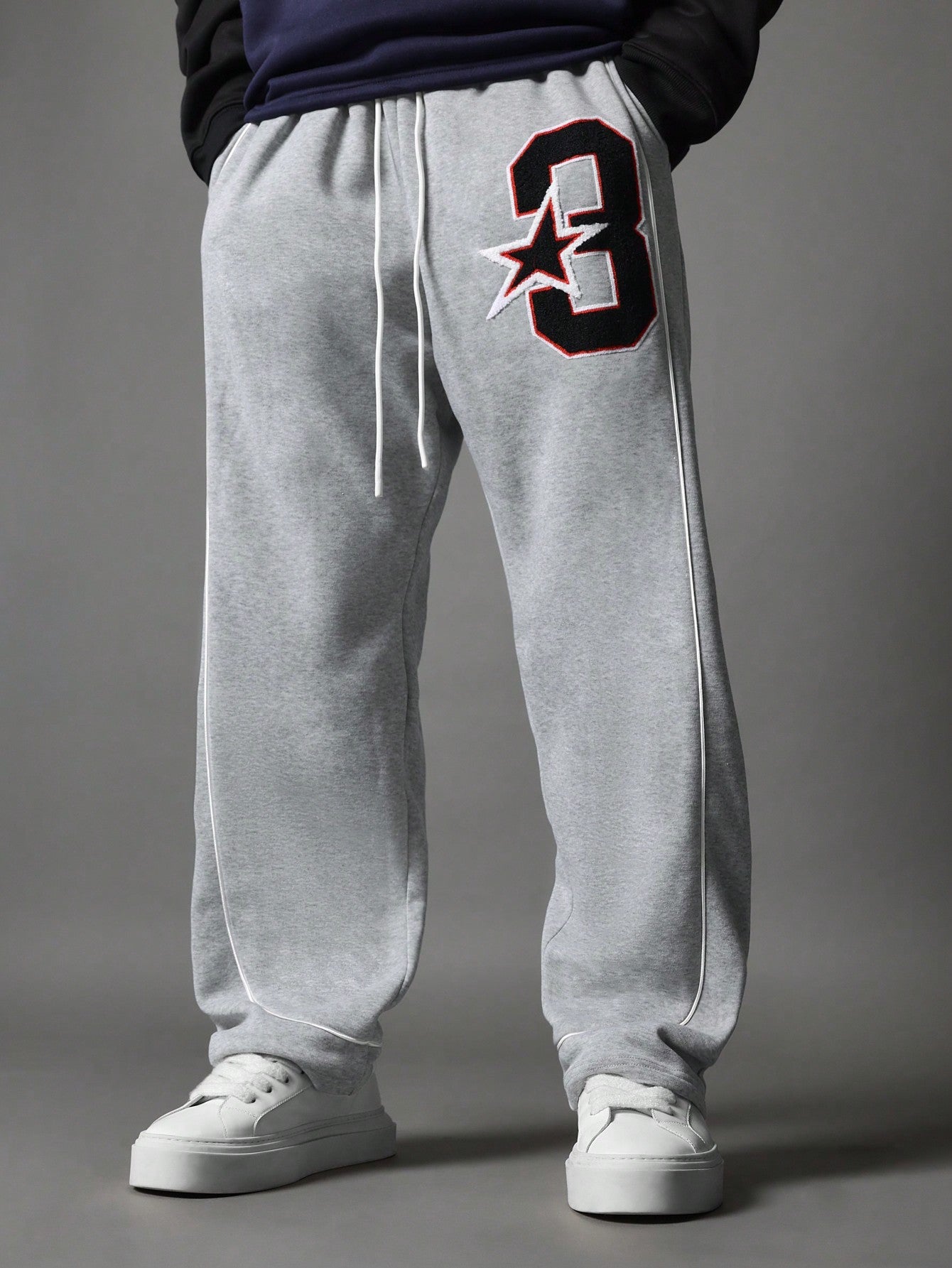 Loose Fit Sweatpants With Embroidered Applique & Piping