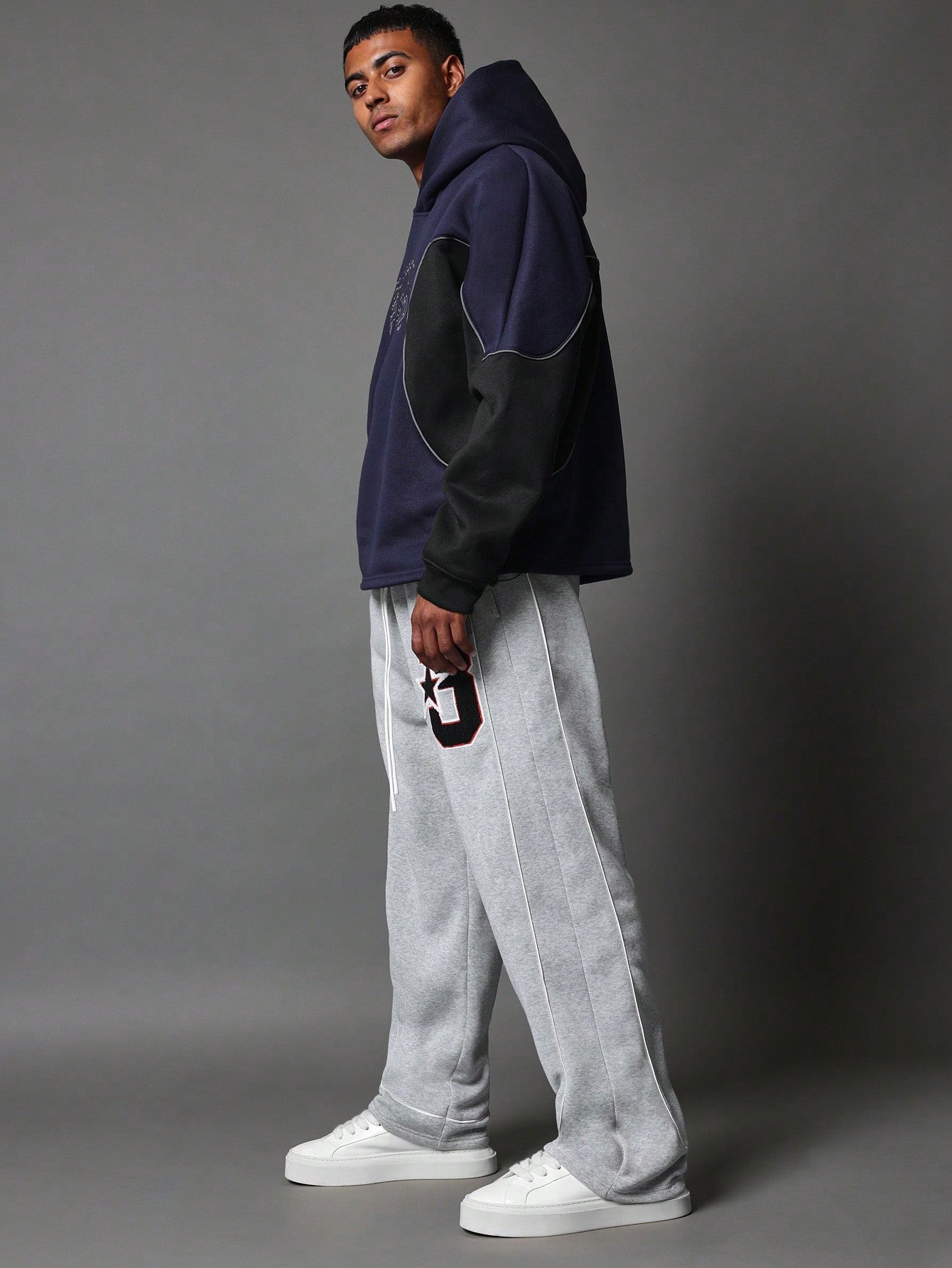 Loose Fit Sweatpants With Embroidered Applique & Piping