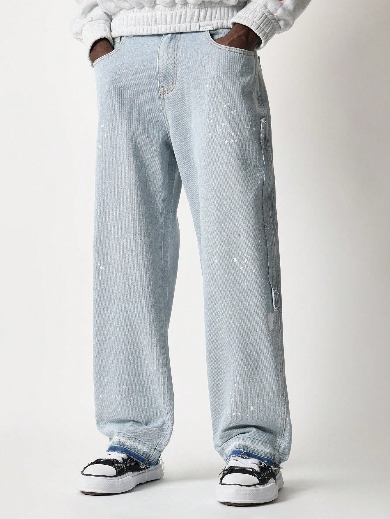 Skater Fit Splatter Paint Jean With Side Raw Edge Panel