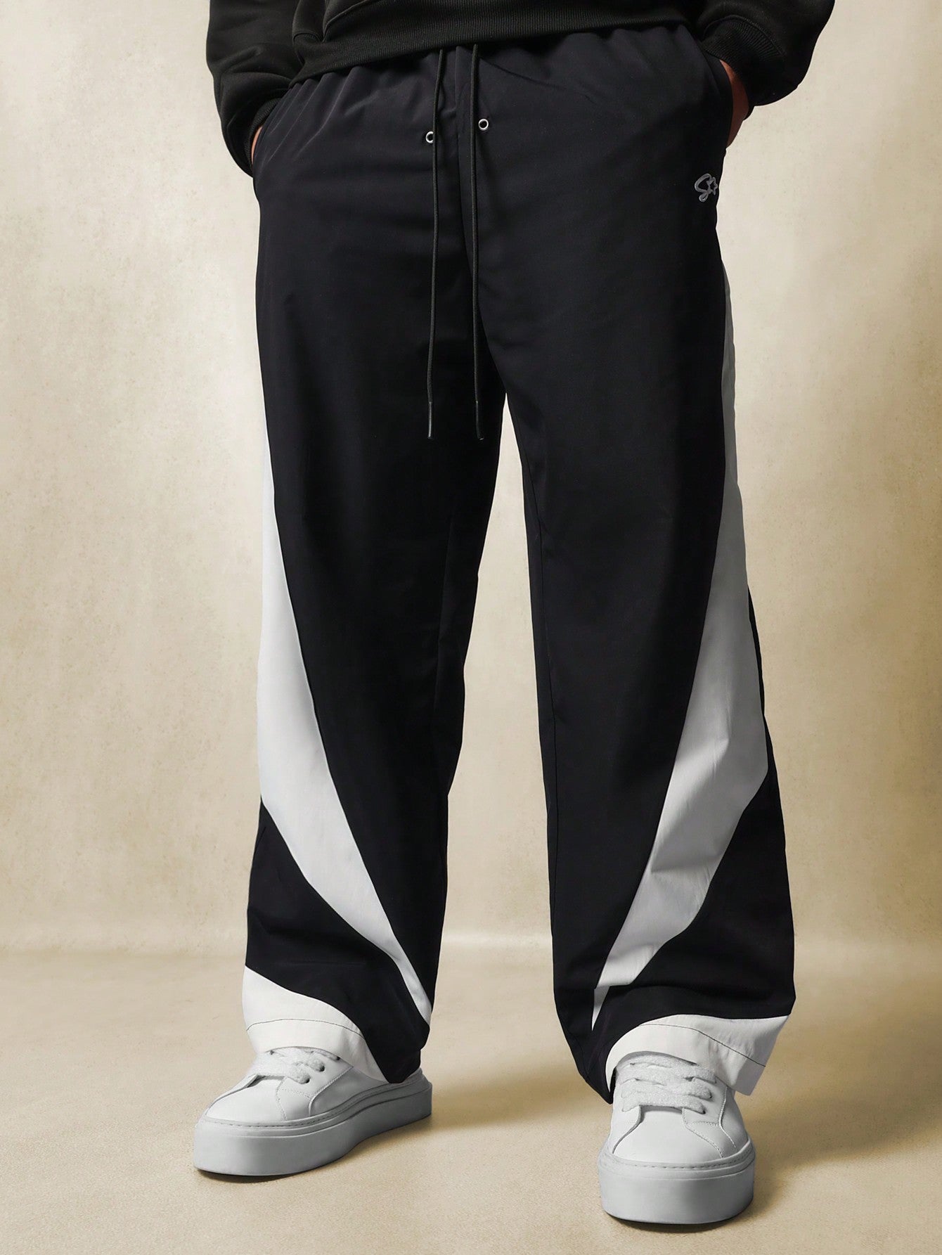 Loose Fit Nylon Pant With Colour Block Panel & Piping