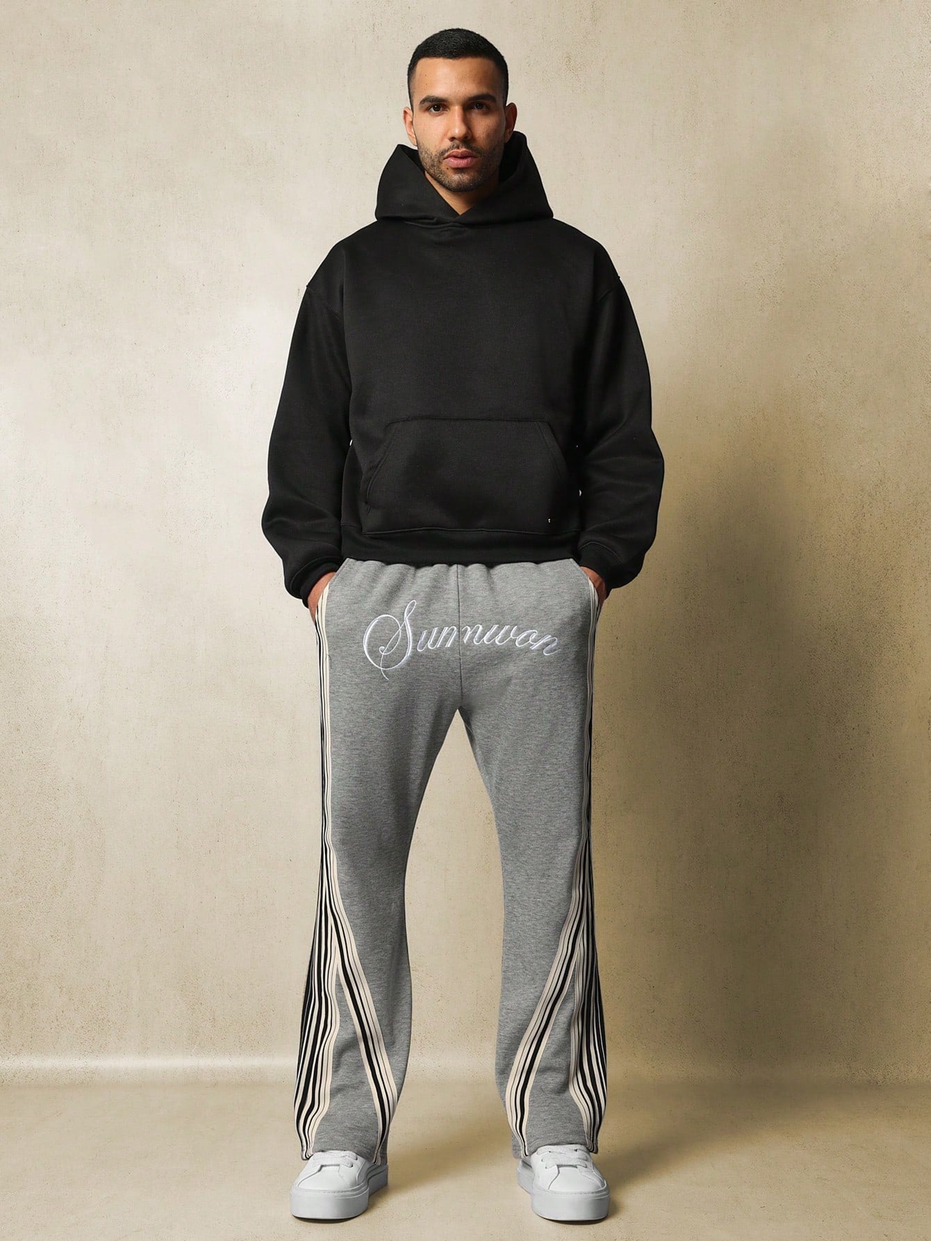 Flare Fit Sweatpants With Embroidery & Side Strip Tape