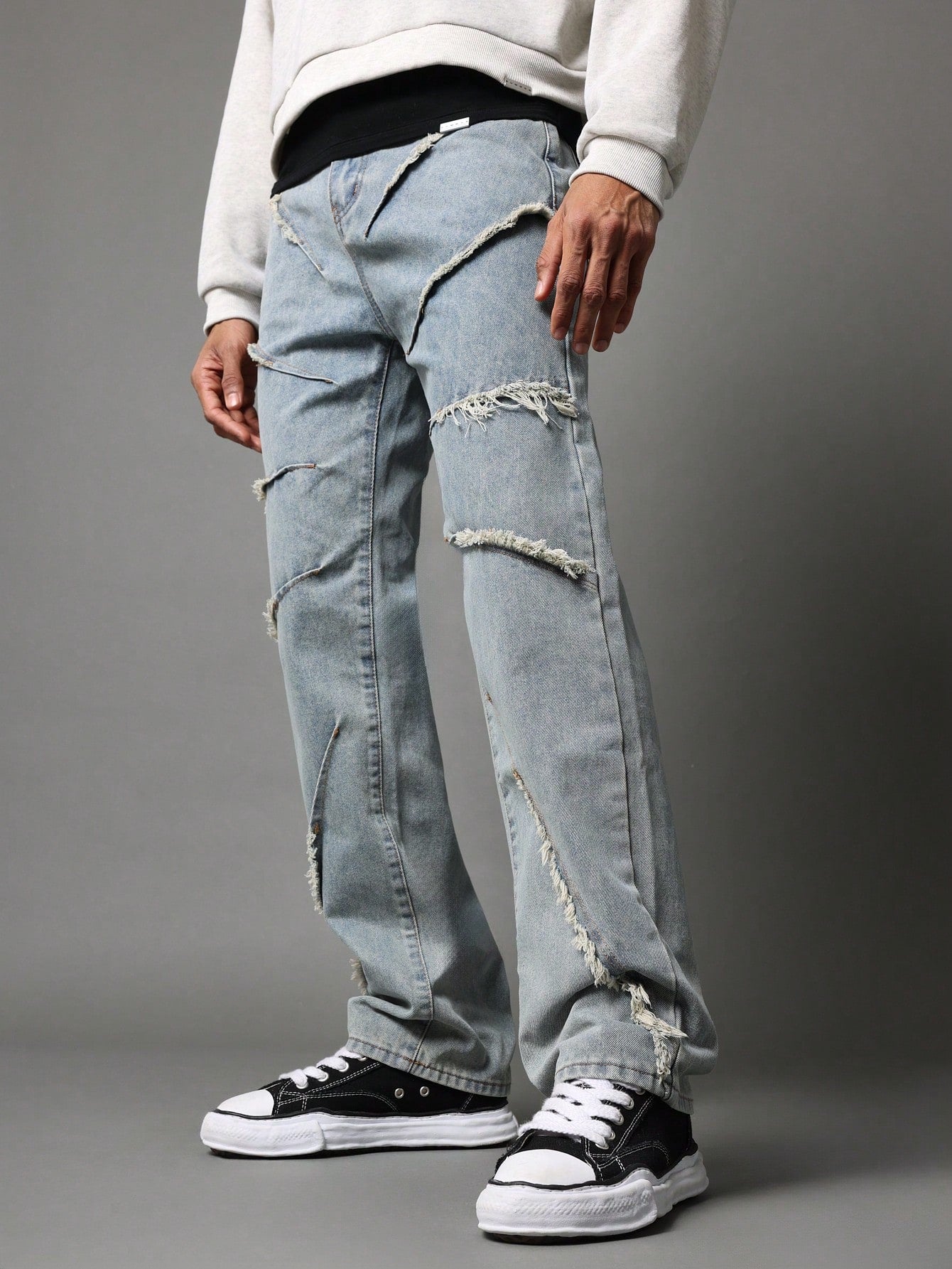 Flare Fit Jean With Raw Edge Seam Detail