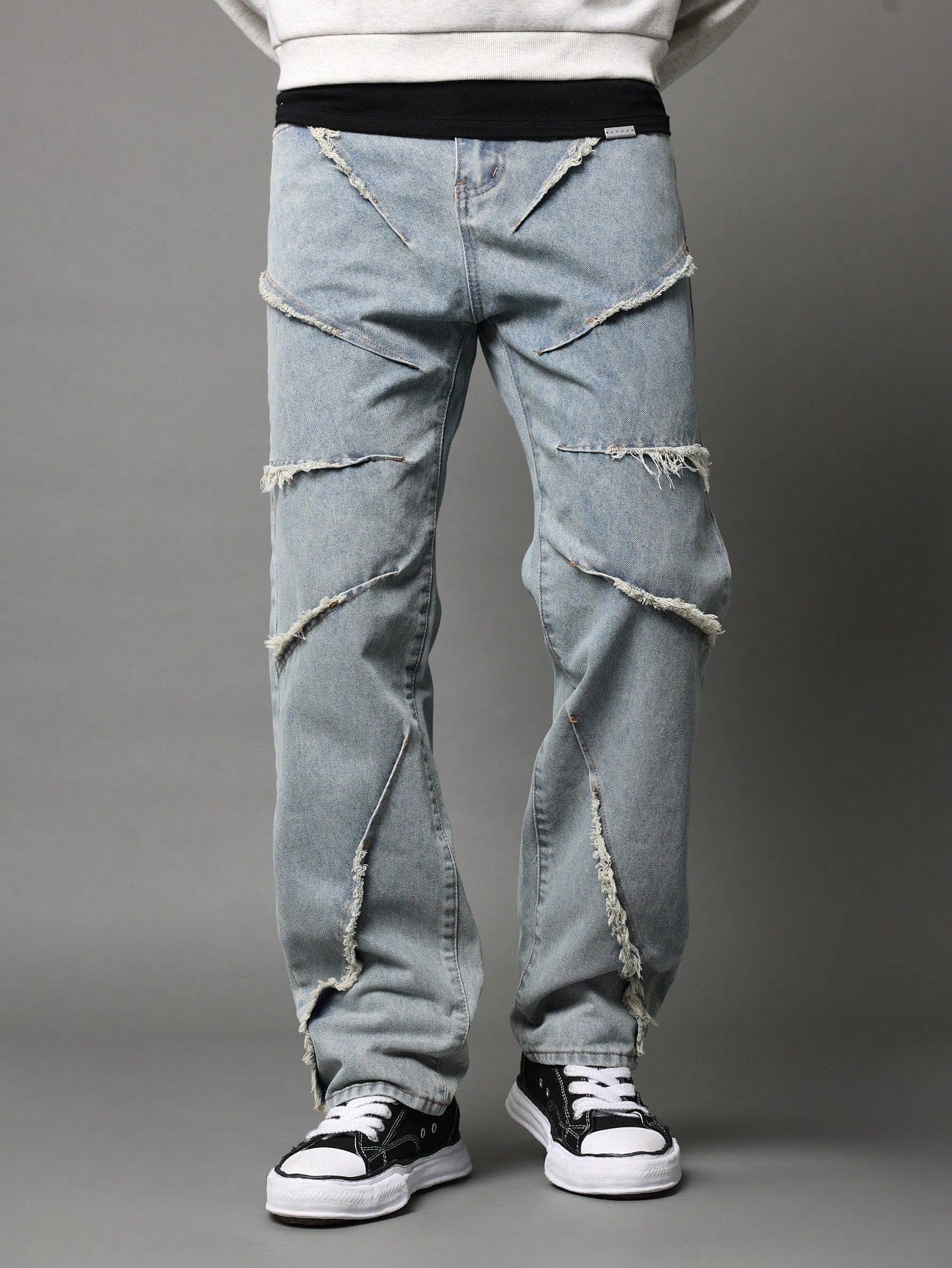 Flare Fit Jean With Raw Edge Seam Detail