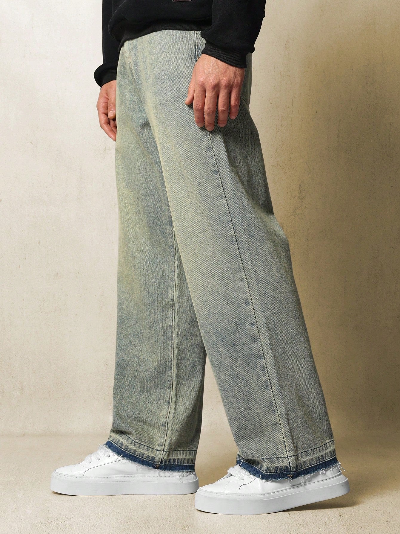 Washed Loose Fit Jeans With Undone Hem