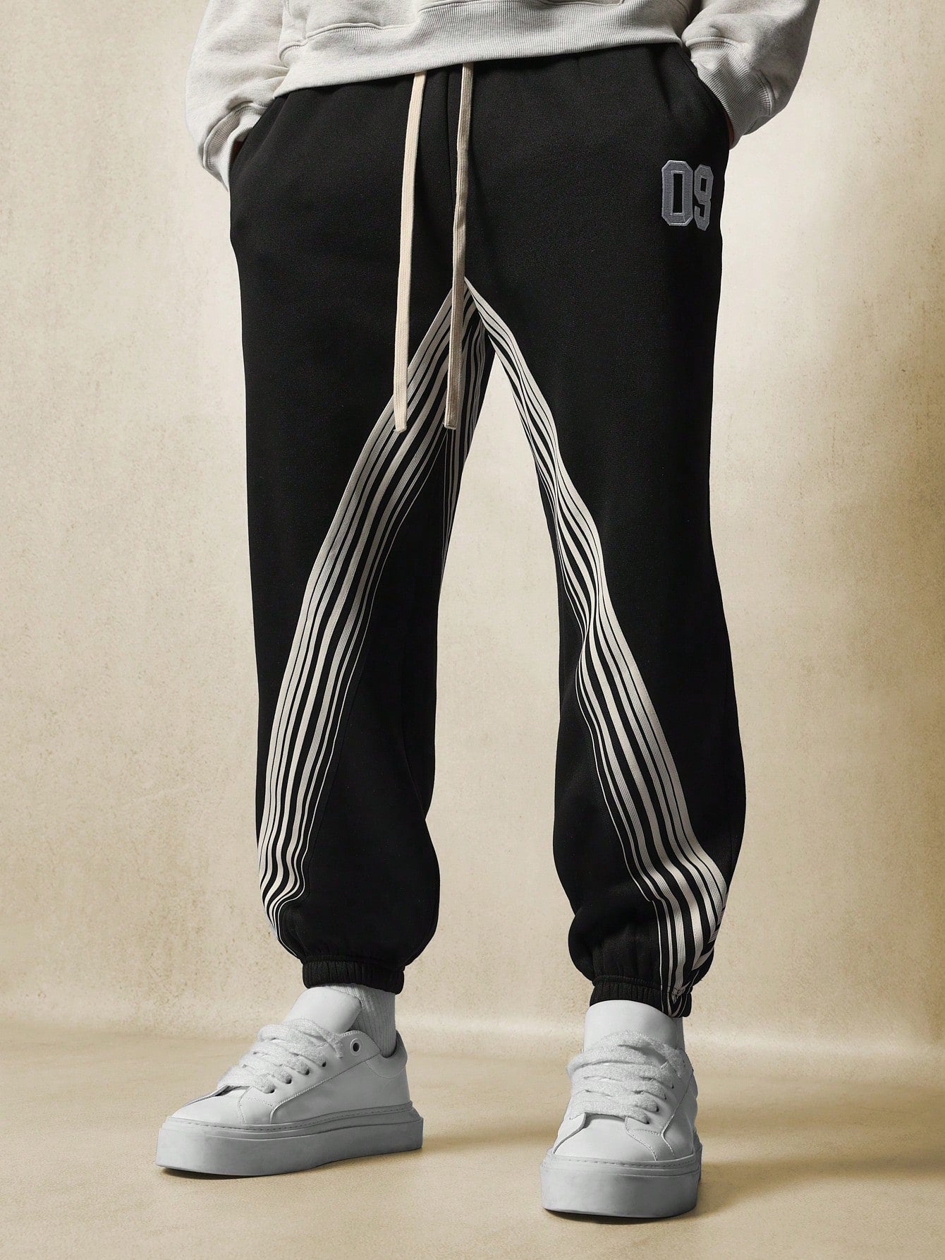 Straight Fit Pull On Drop Crotch Jogger With Tape & Embroidered Applique