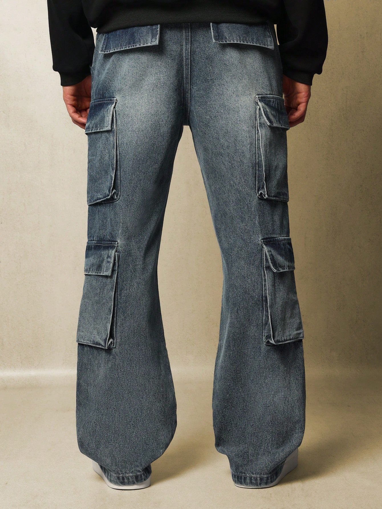 Loose Flare Fit Pull On Mid Wash Multi Pocket Cargo Jean