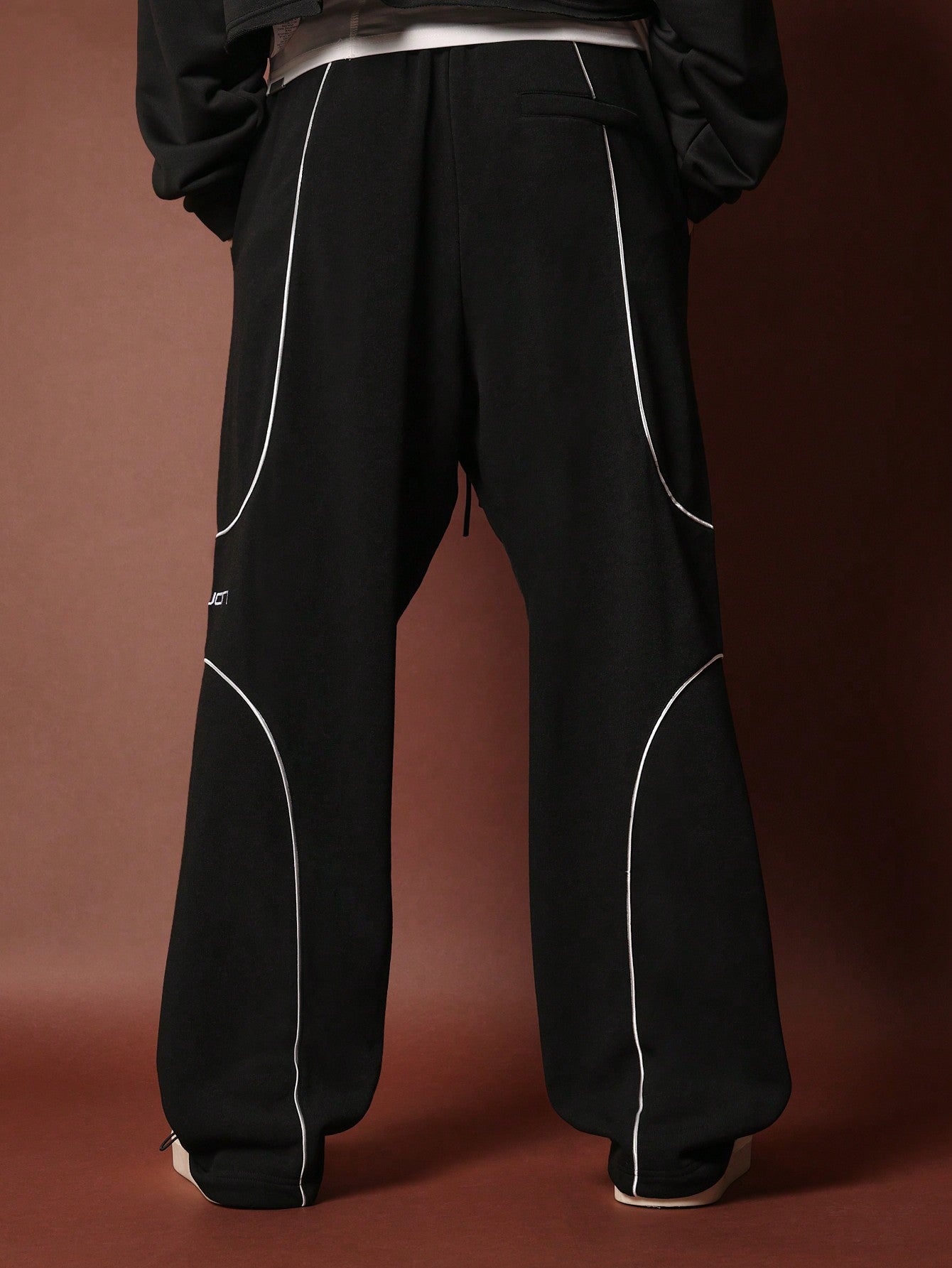 Loose Fit Sweatpants With Piping And Graphic Print