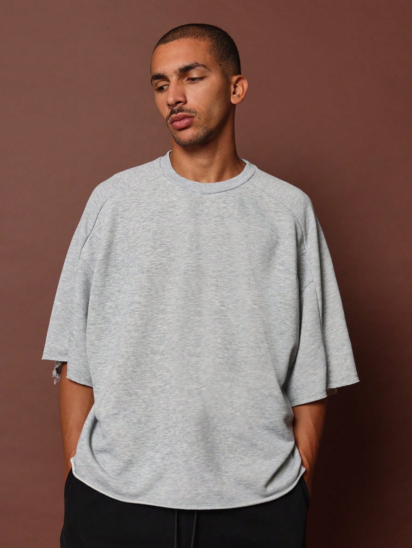 Boxy Fit Raw Edge Panel Elbow Sleeve Tee