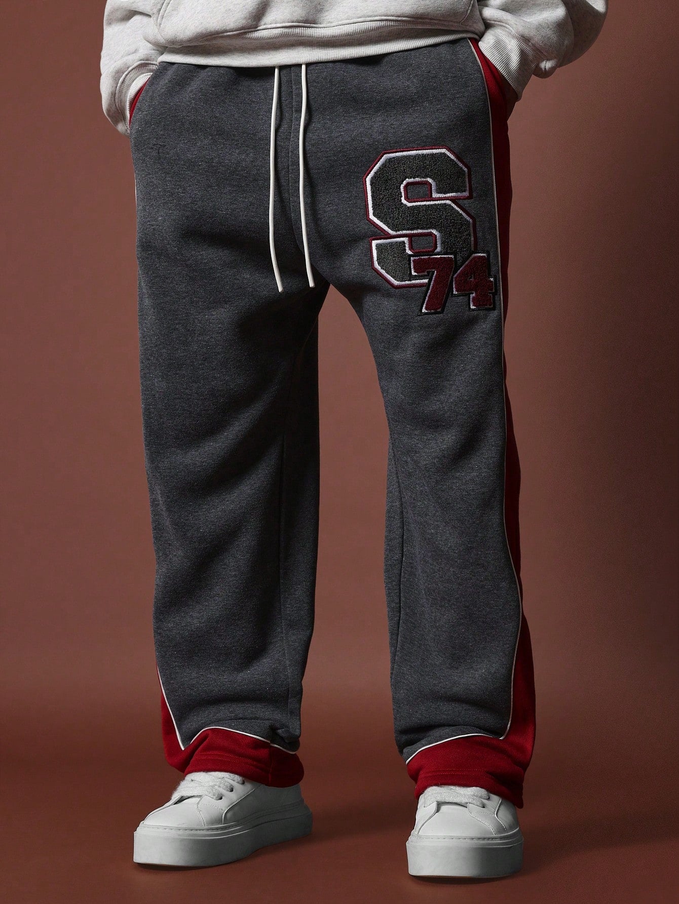 Wide Fit Drop Crotch Colour Block Panel Sweatpants With Embroidered Applique & Piping