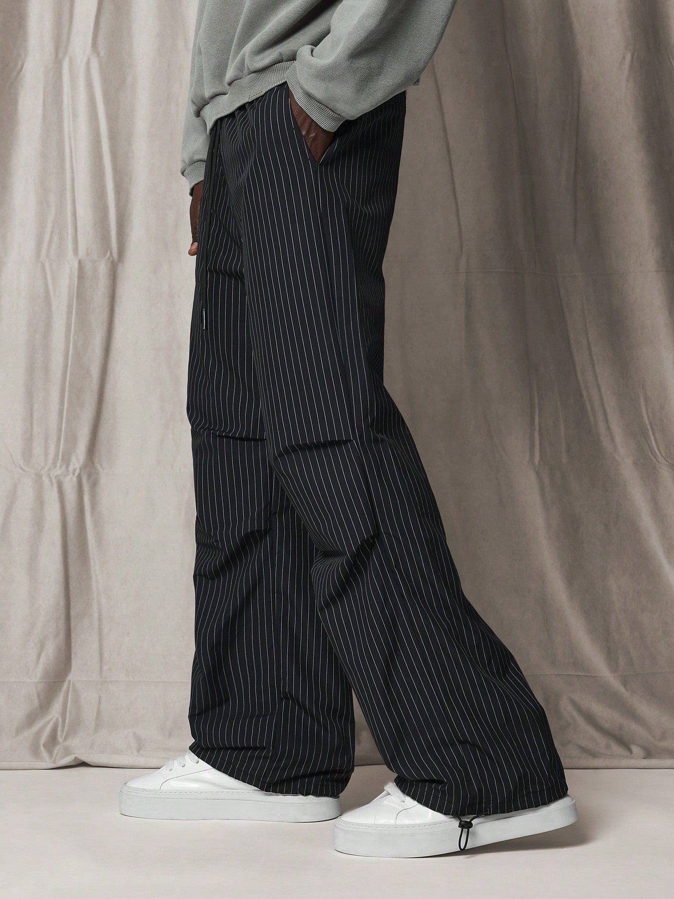 Loose Flare Fit Pinstripe Pant With Knee Pleats