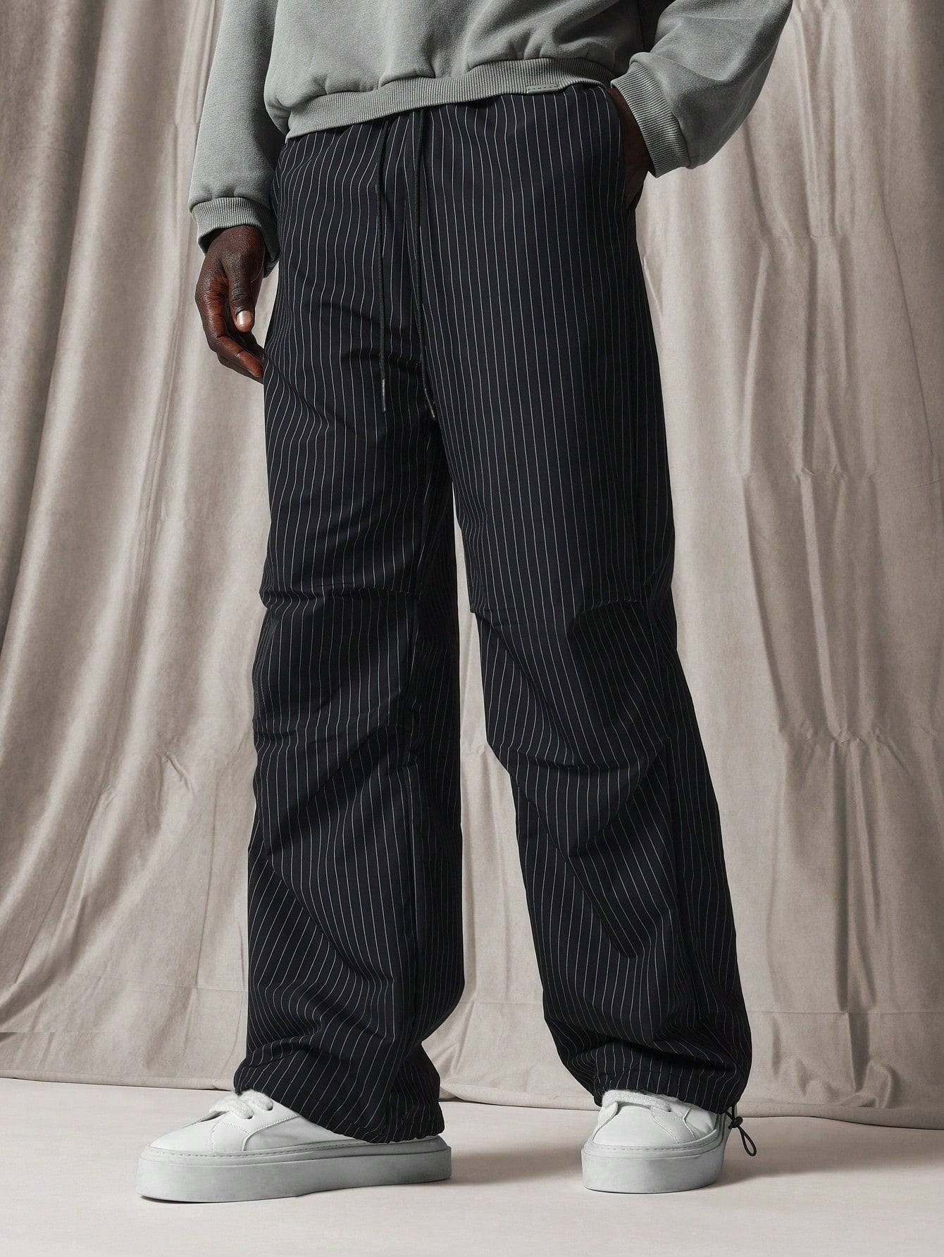 Loose Flare Fit Pinstripe Pant With Knee Pleats