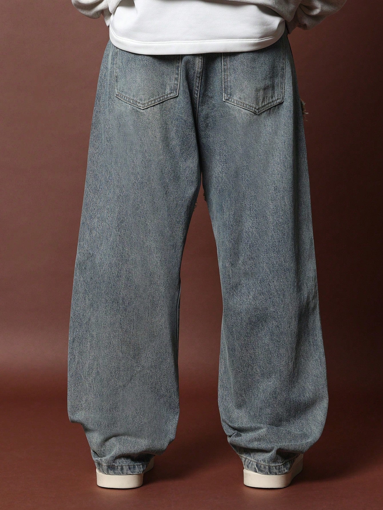 Loose Fit Dirty Wash Jean With Raw Edge Seam Details