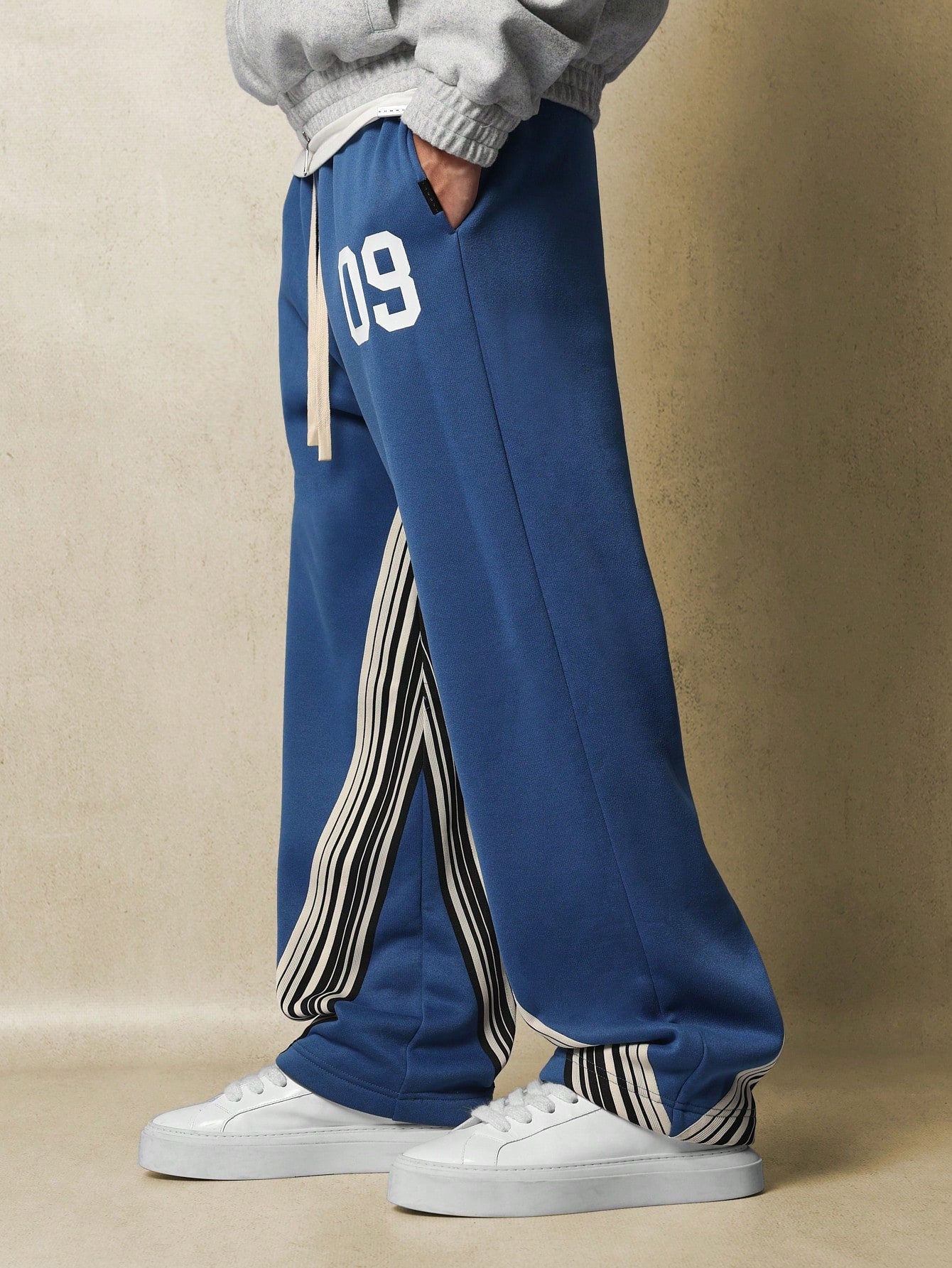 Wide Fit Drop Crotch Sweatpants With Stripe Tape & Graphic Print