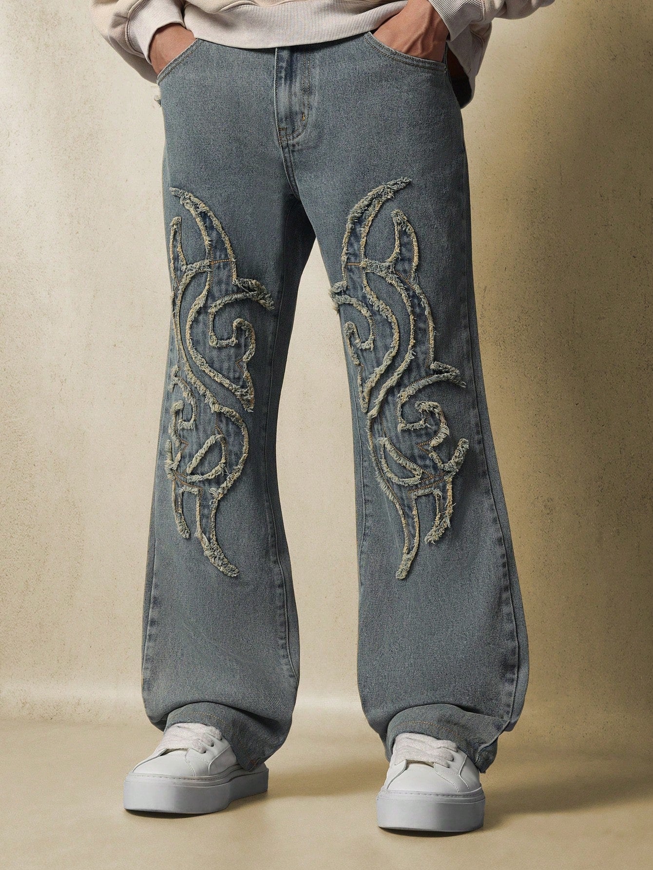 Loose Flare Fit Jean With Embroidered Self-Fabric Patches