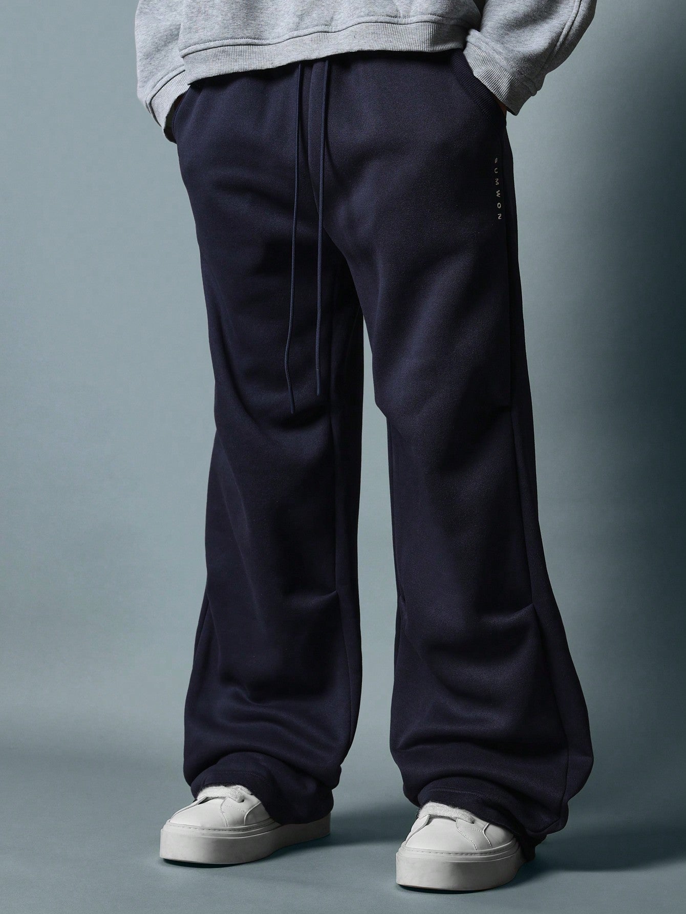 Wide Leg Jogger With Raw Edge Back Pocket Detail