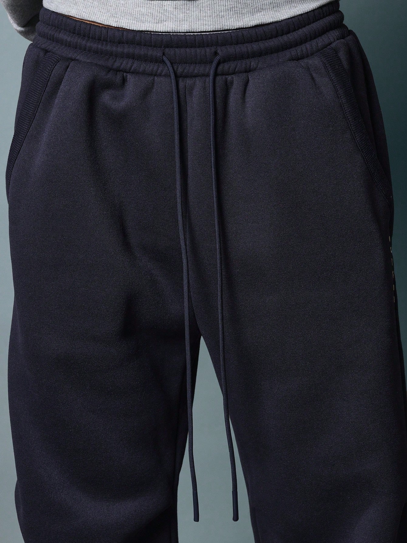 Wide Leg Jogger With Raw Edge Back Pocket Detail