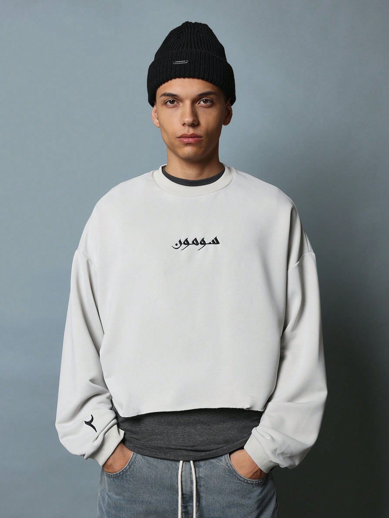 Crop Fit Raw Edge Hem Sweatshirt With Arabic Letter & Number Graphic Print