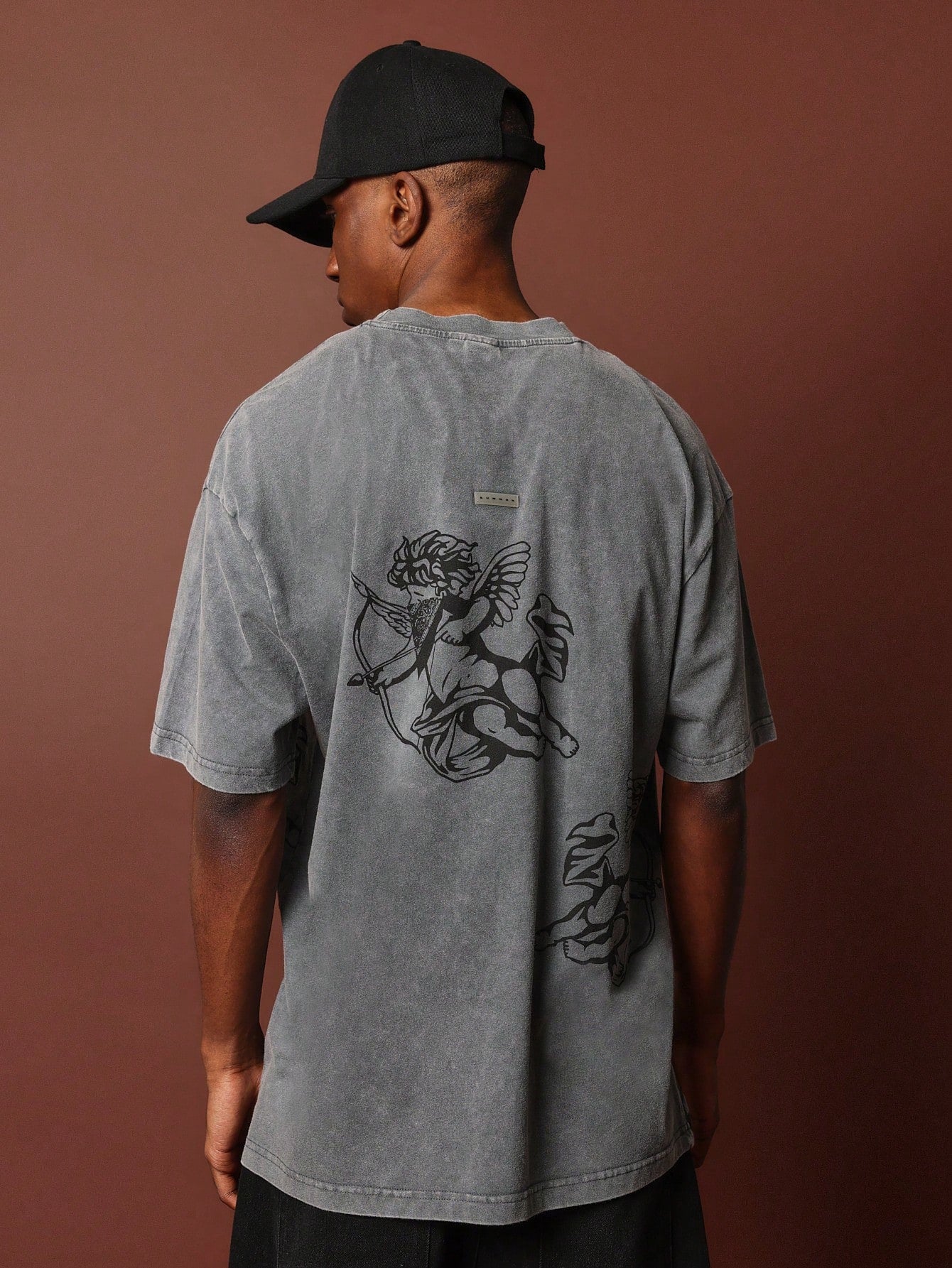 Oversized Fit Short Sleeve Washed Tee With Cherub Graphic Print