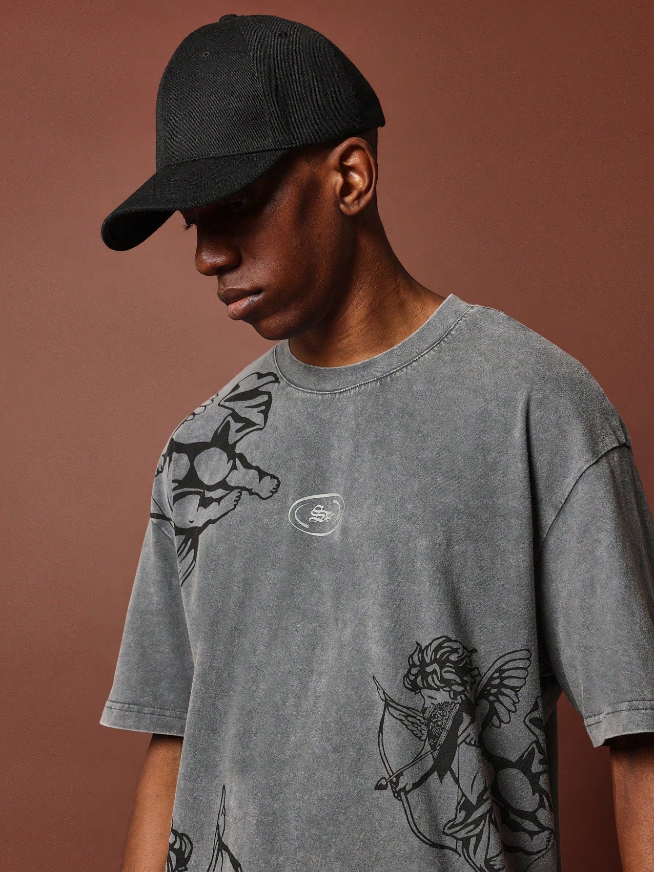 Oversized Fit Short Sleeve Washed Tee With Cherub Graphic Print