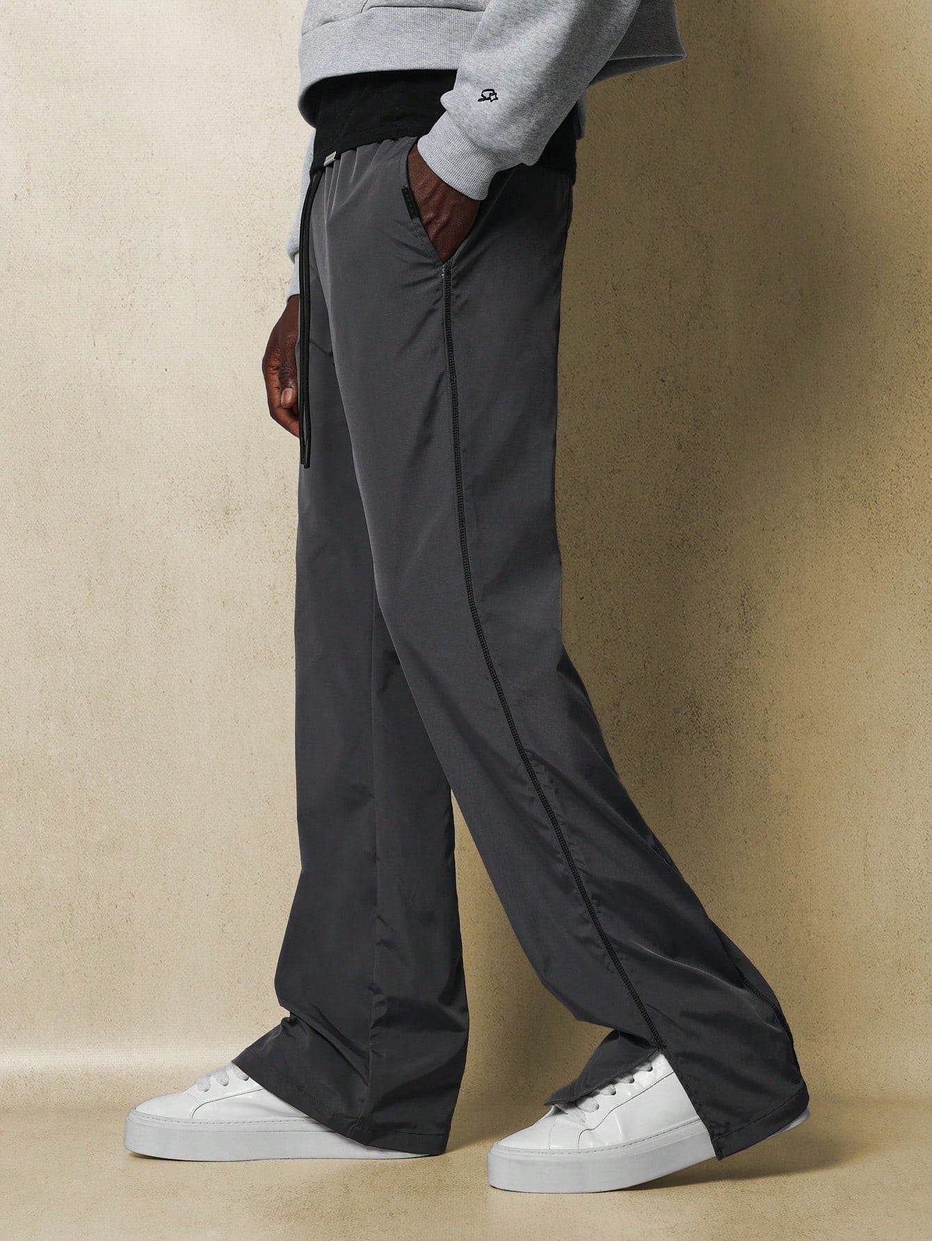 Flare Fit Split Hem Nylon Pant With Contrast Stitching