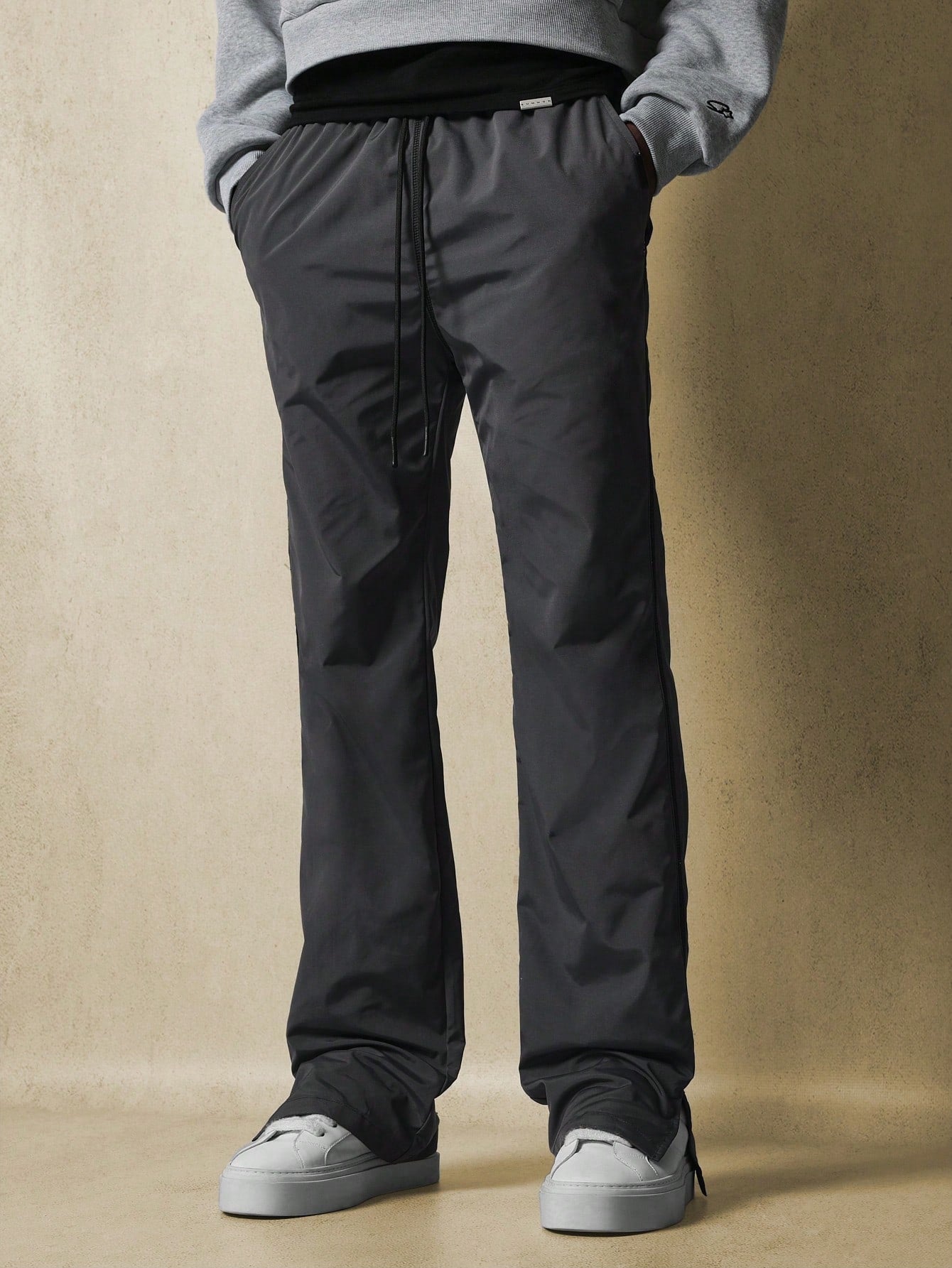 Flare Fit Split Hem Nylon Pant With Contrast Stitching