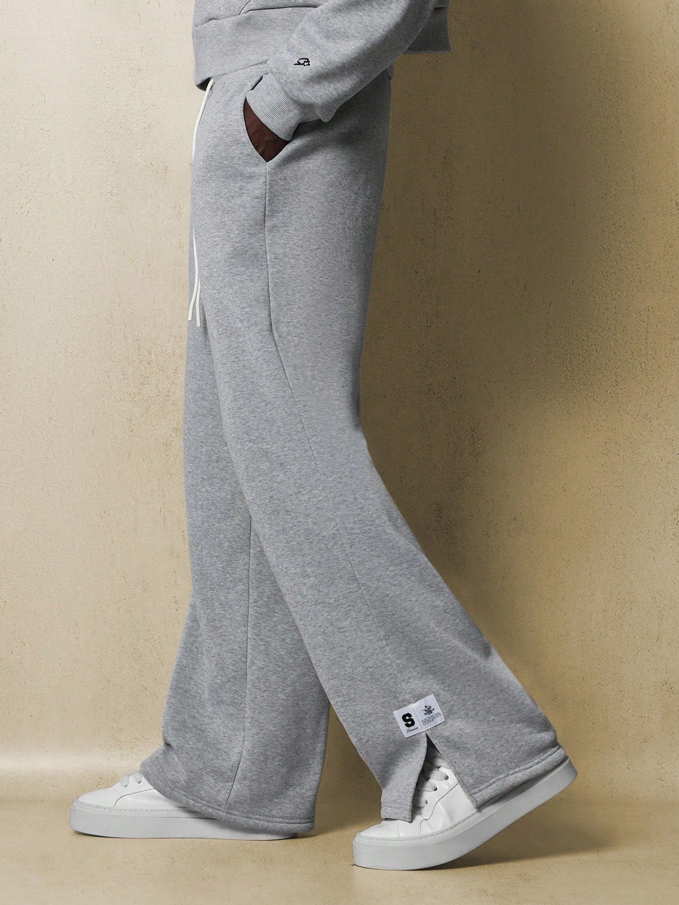 Straight Fit Pants With Side Slits And Label