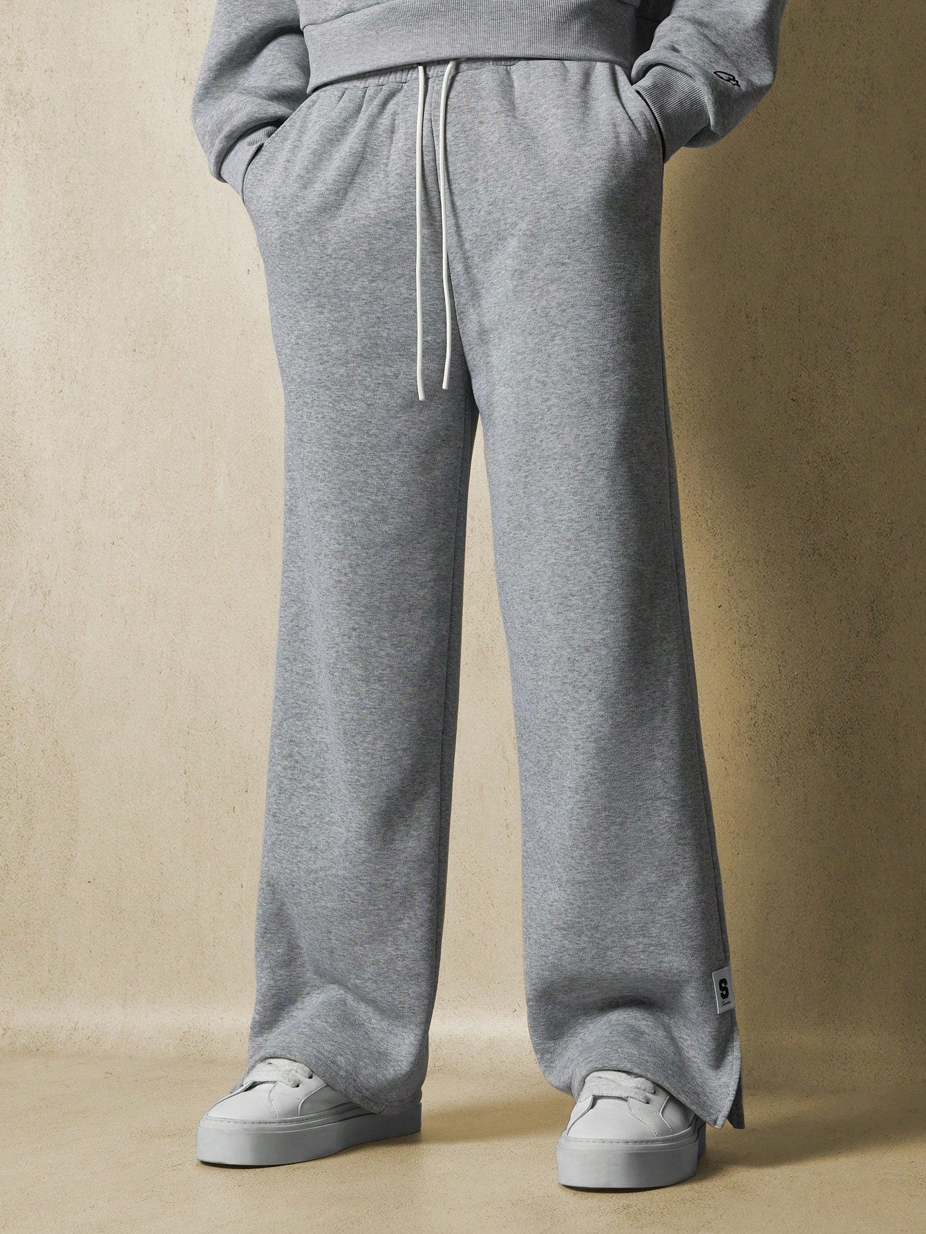 Straight Fit Pants With Side Slits And Label