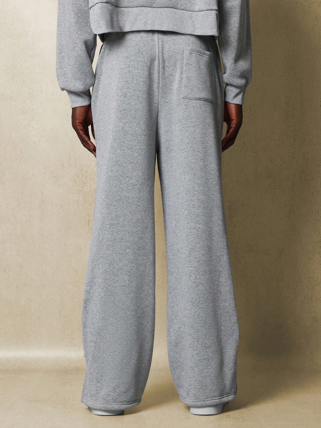 Straight Fit Pants With Side Slits And Label