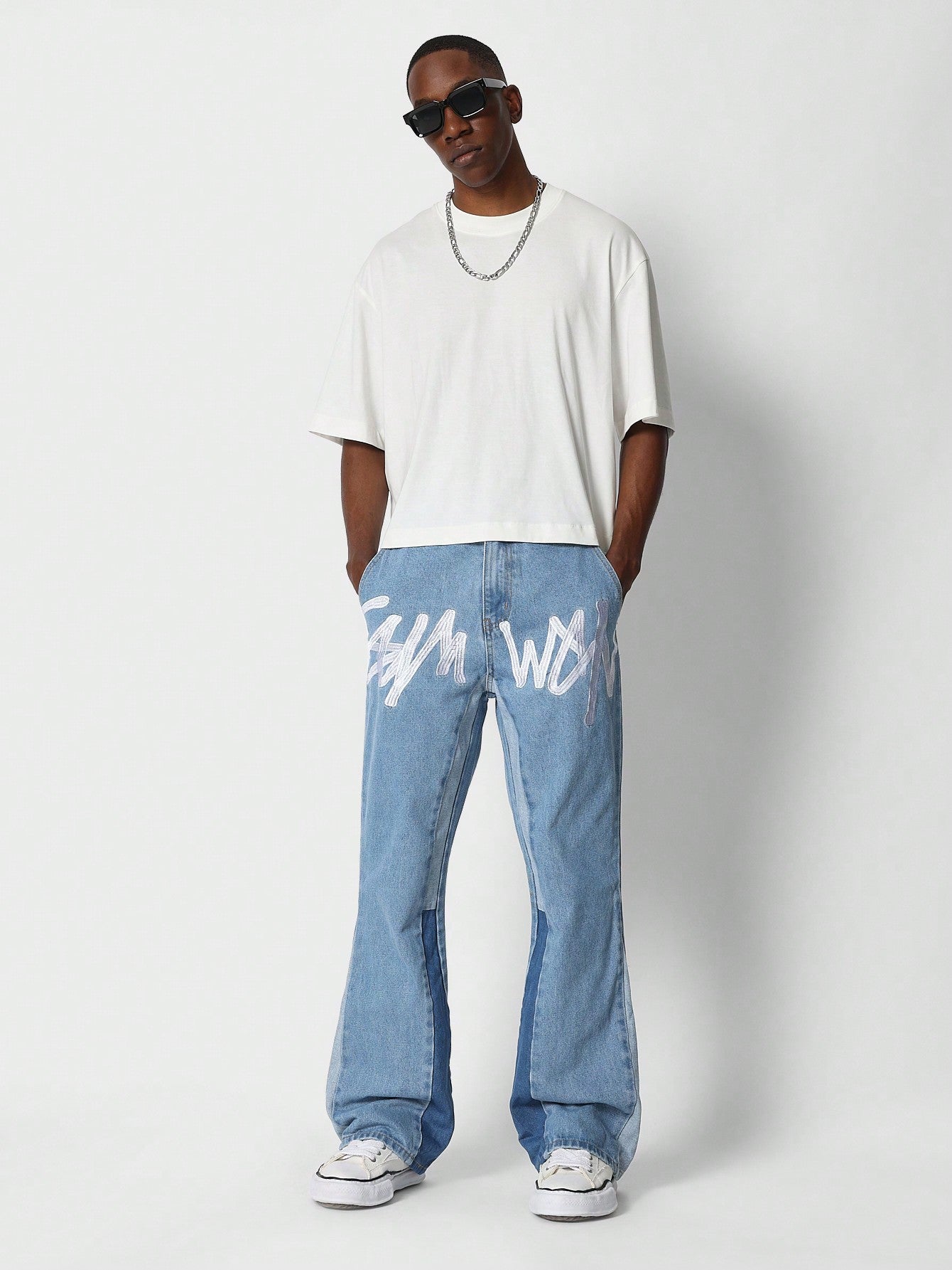 Flare Fit Colour Blocked Jean With Front Graphic