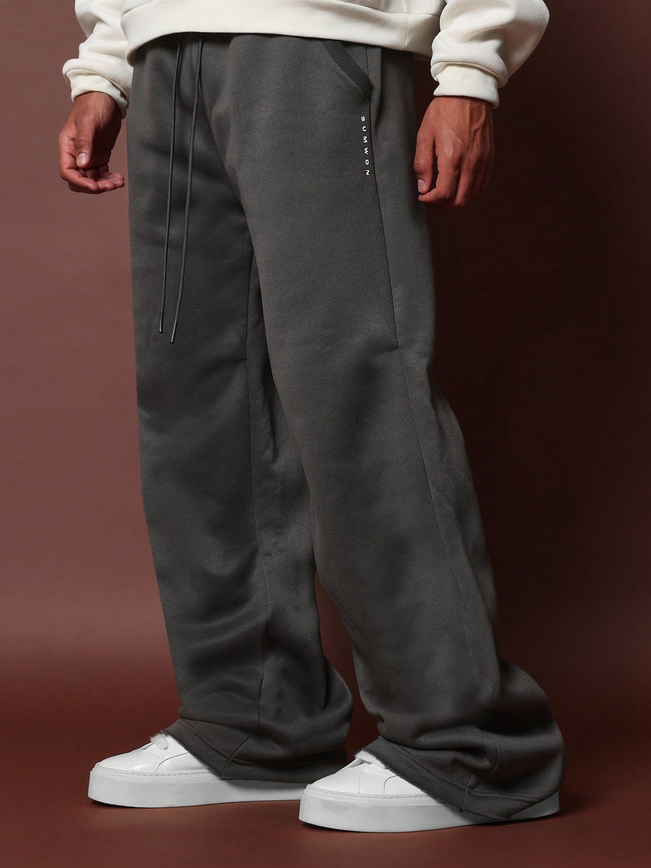 Wide Leg Jogger With Raw Edge Back Pocket Detail