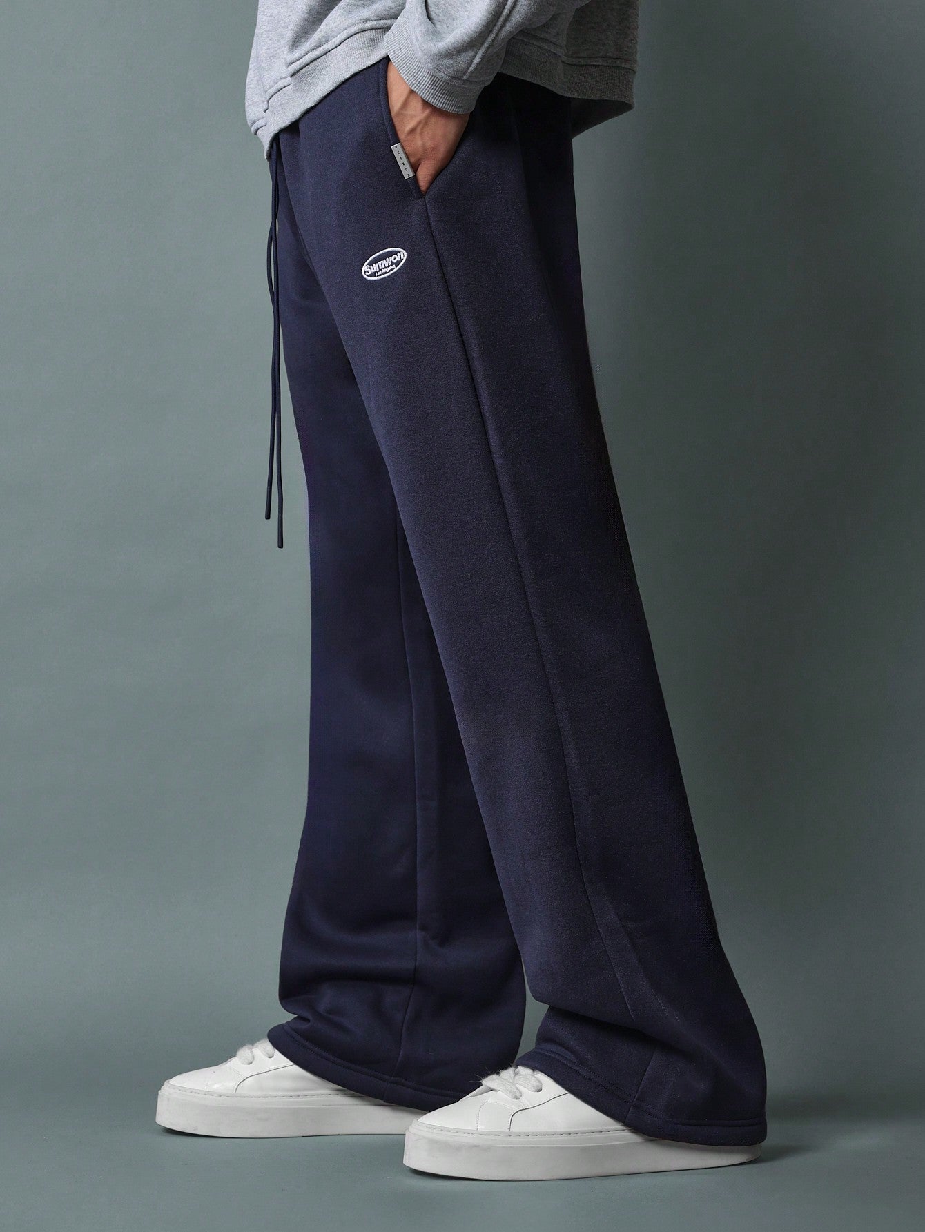 Flare Fit Sweatpants With Split Hem And Logo Embroidery