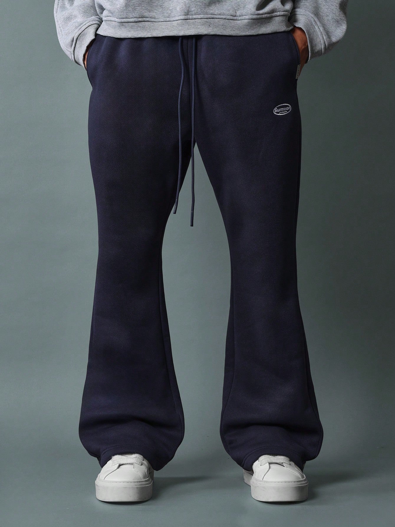 Flare Fit Sweatpants With Split Hem And Logo Embroidery