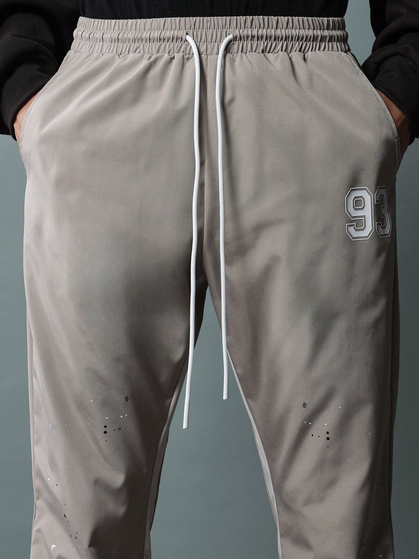 Flare Fit Contrast Colour Side Panel Nylon Pant With Splatter Paint And Number Graphic Print & Drawstrings