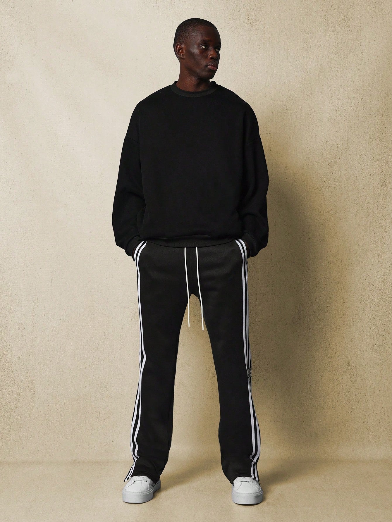 Flare Fit Sweatpants With Side Split And Stripe Tape Detail & Label