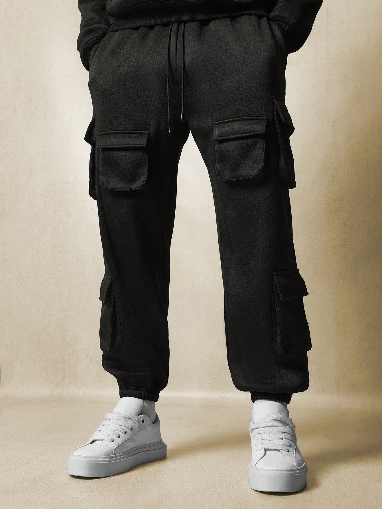 Drop Crotch Exposed Multi Pocket Cargo Jogger