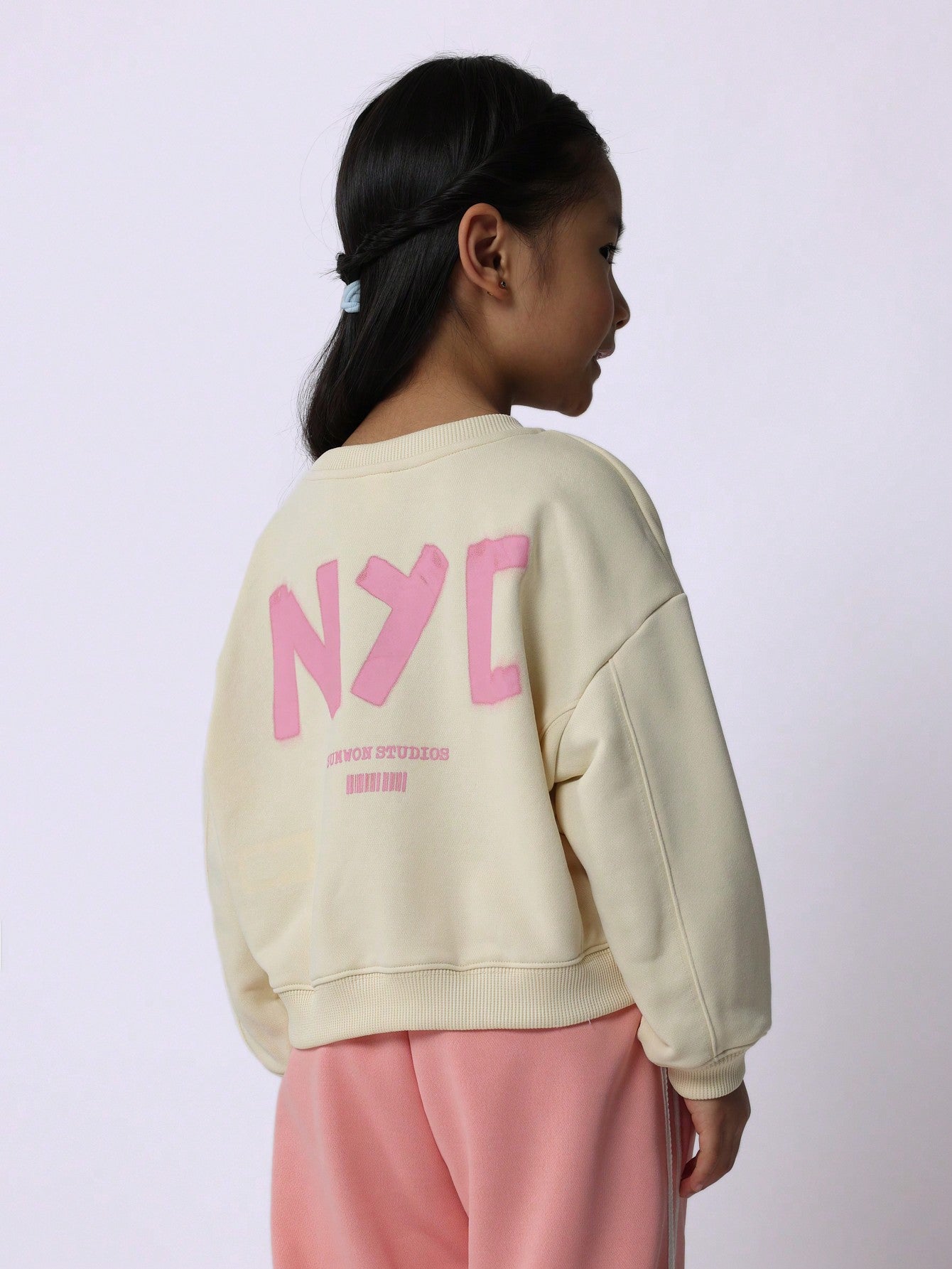 Young Girls Comfy Cream Sweatshirt With NYC Graphic Print