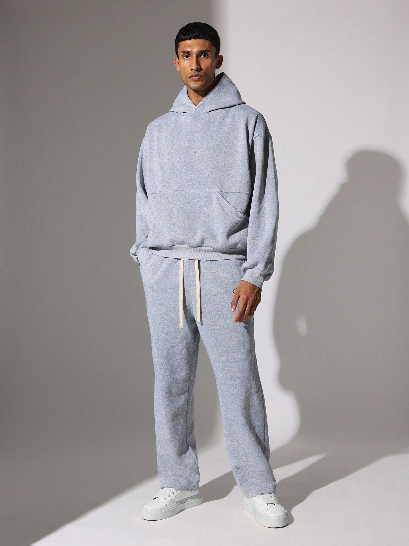 Regular Fit Overhead Hoodie With Kangaroo Pocket And Flare Fit Jogger 2 Piece Set