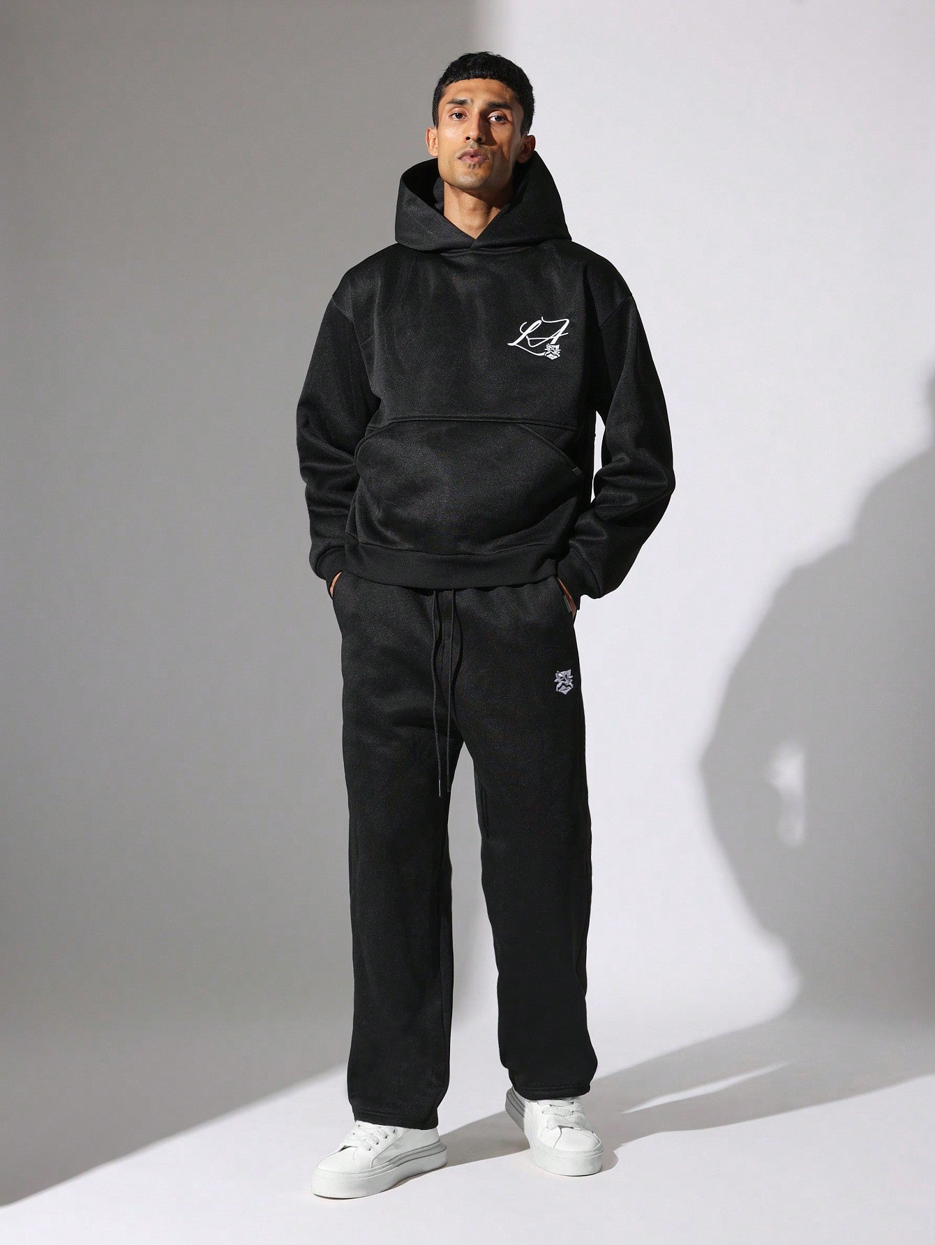 Regular Fit Overhead Hoodie With Kangaroo Pocket And Drop Crotch Sweatpants With Graphic Print & Drawstrings 2 Piece Set